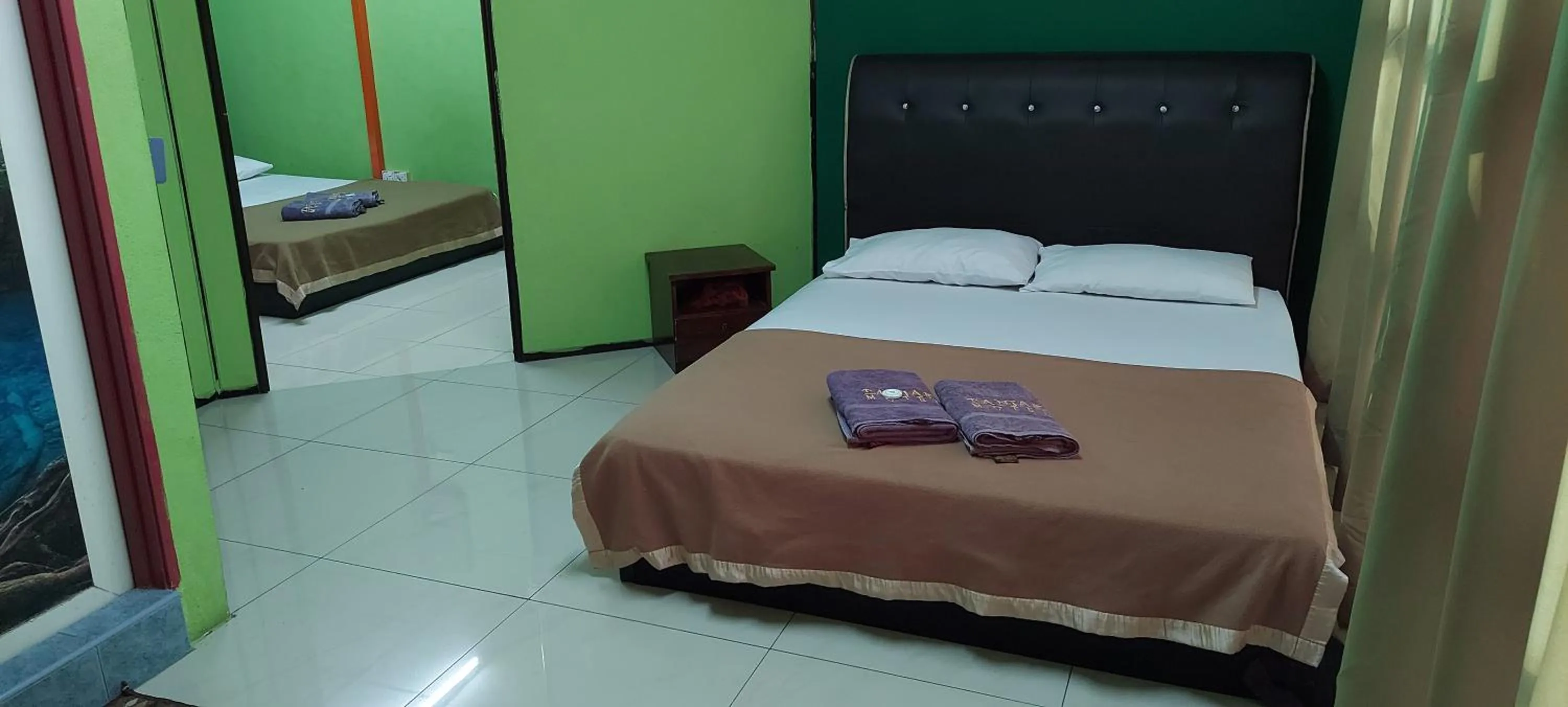 Bed in Tanjak Hotel