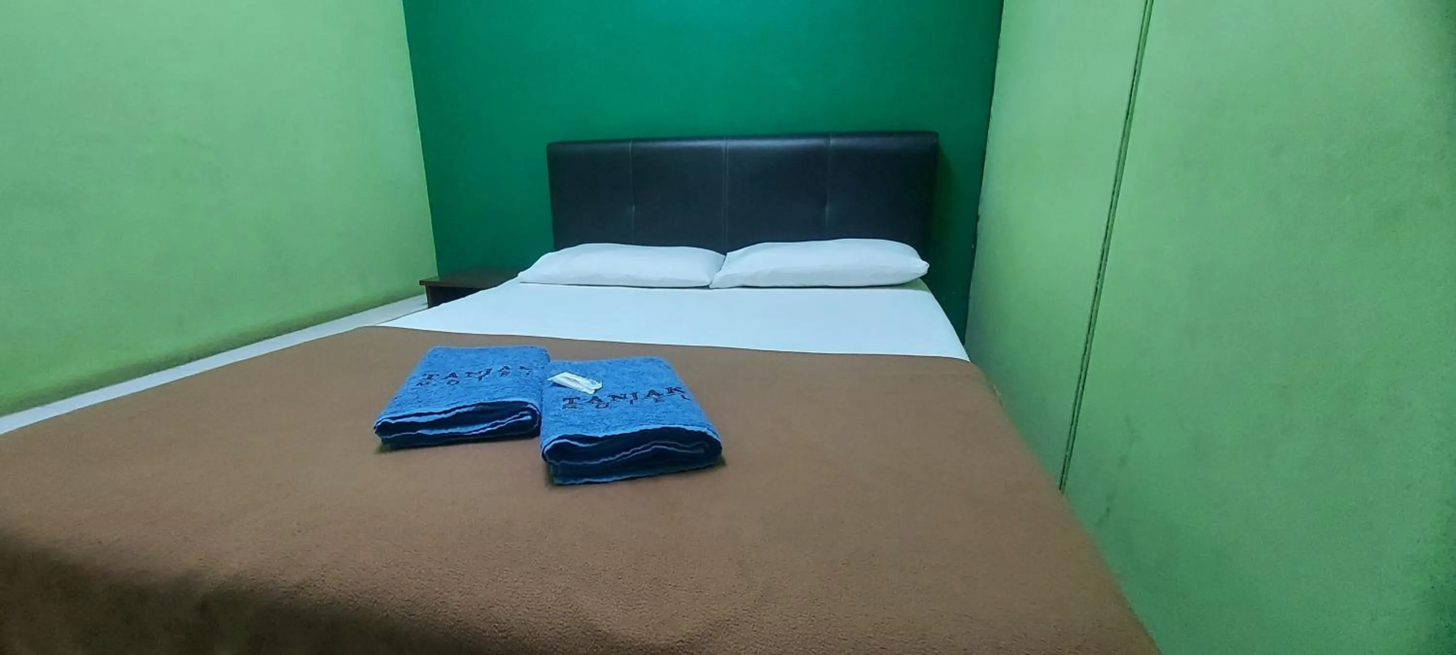 Bed in Tanjak Hotel