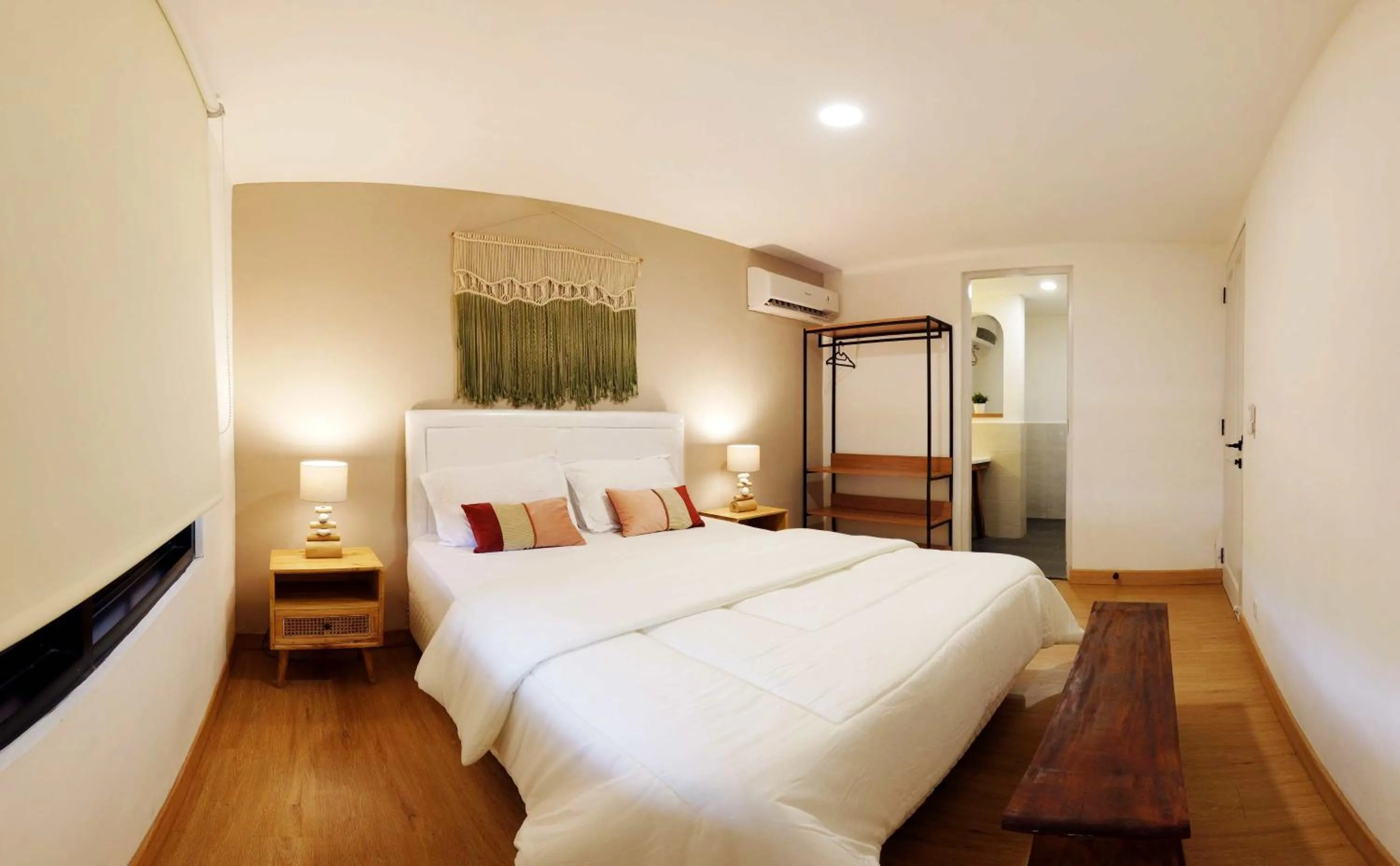 Bedroom, Bed in Ocean Beach Villas - Carita Kondominium