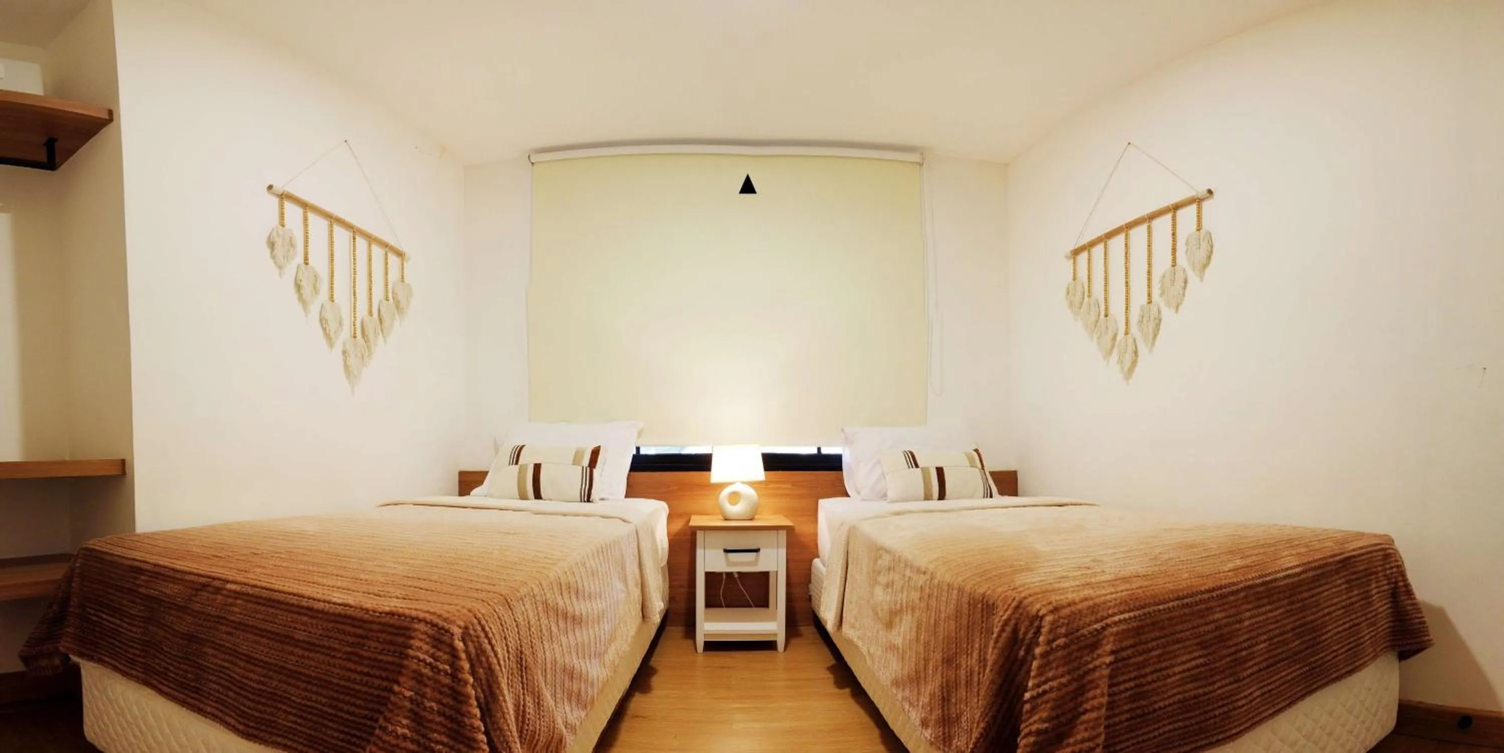 Bedroom, Bed in Ocean Beach Villas - Carita Kondominium