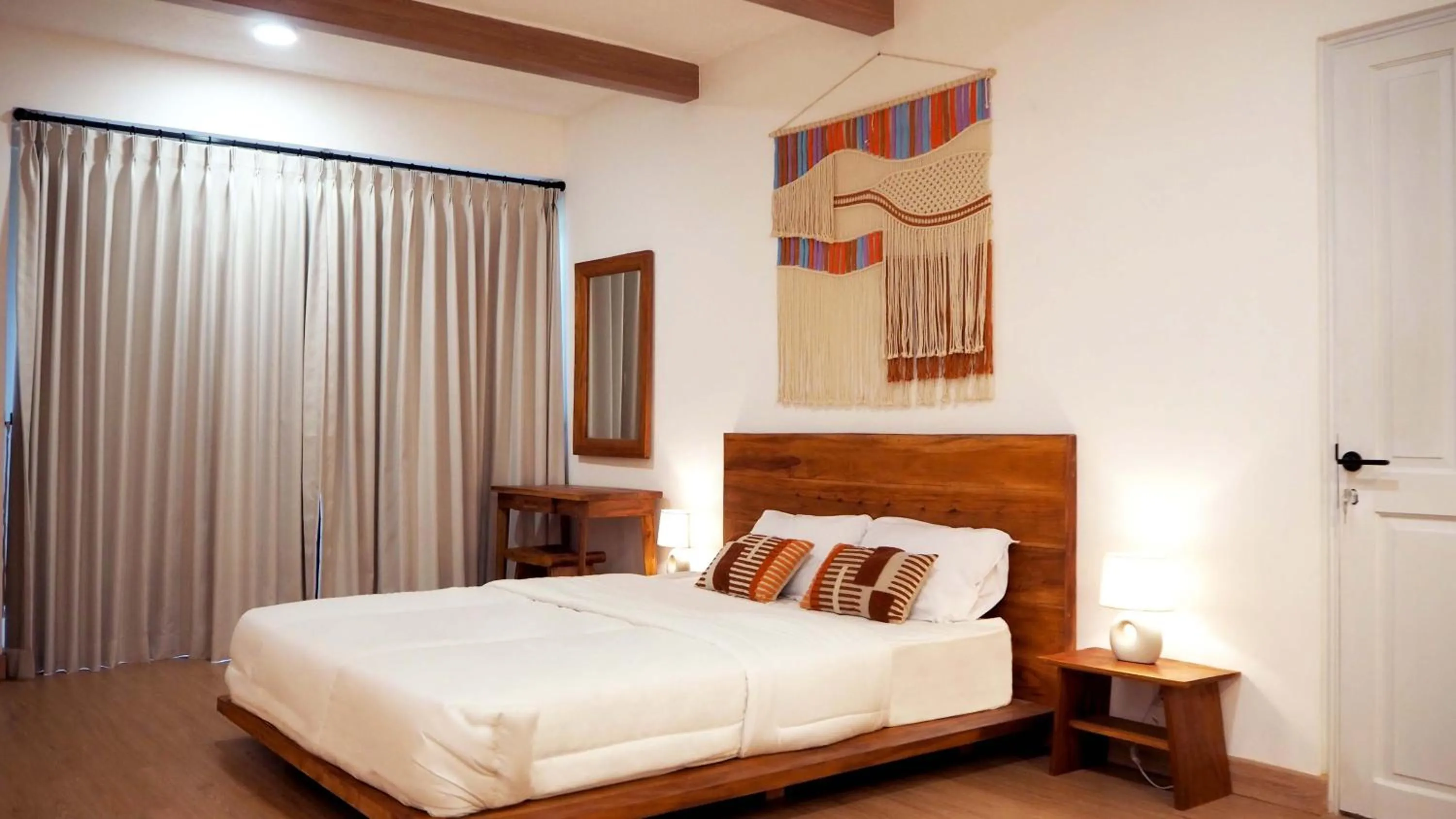 Bedroom, Bed in Ocean Beach Villas - Carita Kondominium