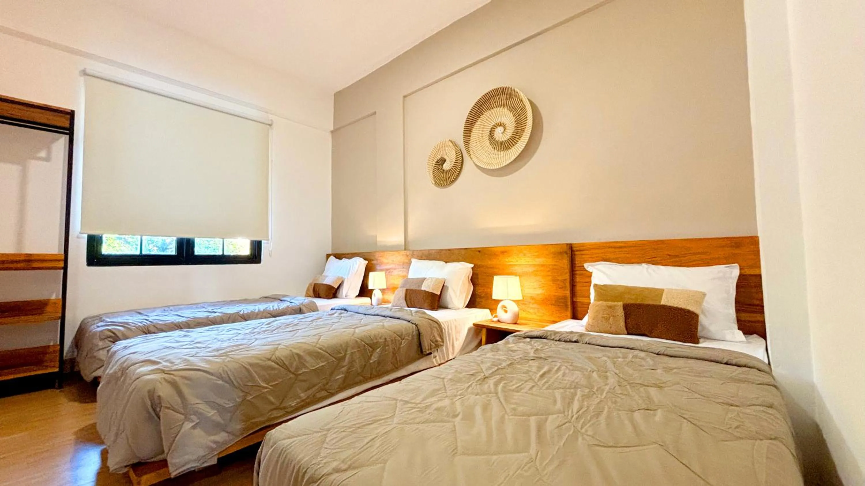 Bedroom, Bed in Ocean Beach Villas - Carita Kondominium