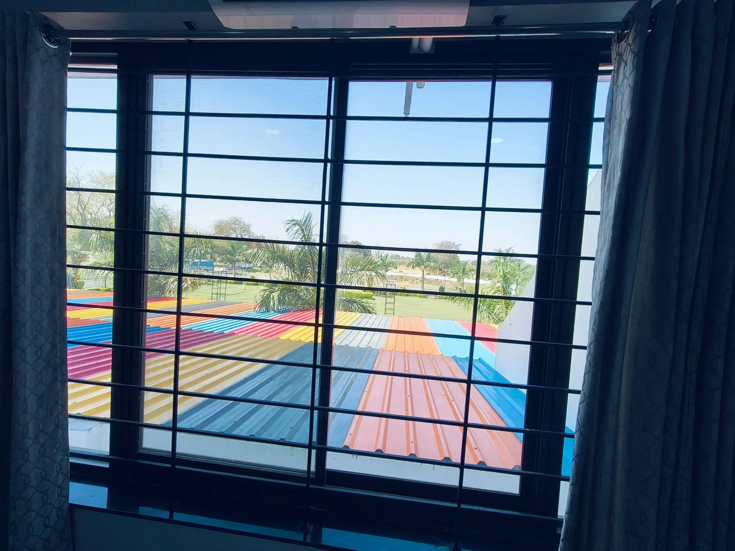 Garden view in HOTEL MUSHAK by BAPPA PALACE