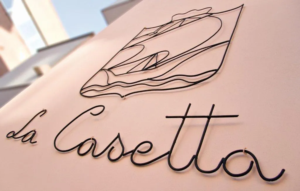 Property logo or sign in Residence La Casetta