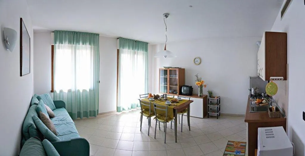 Communal kitchen in Residence La Casetta
