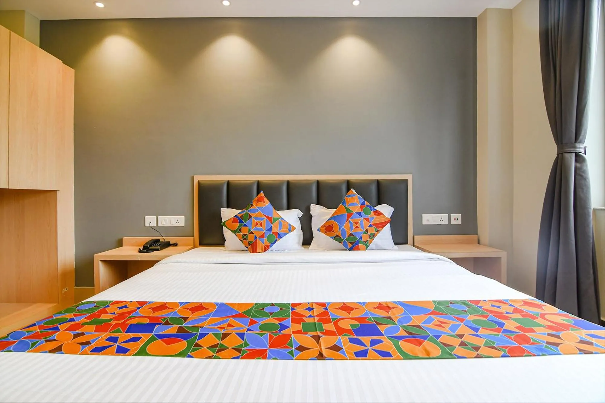 Bed in FabHotel JP - Nr Sataragachhi Railway Station