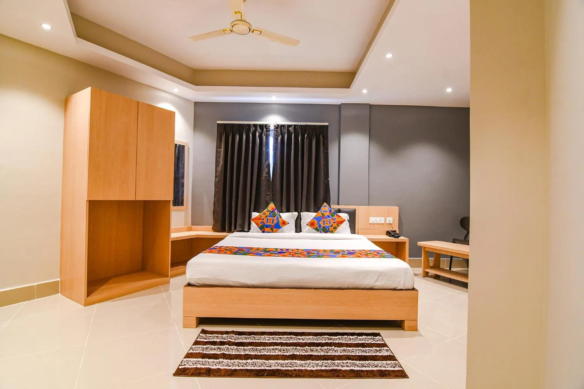 Bed in FabHotel JP - Nr Sataragachhi Railway Station