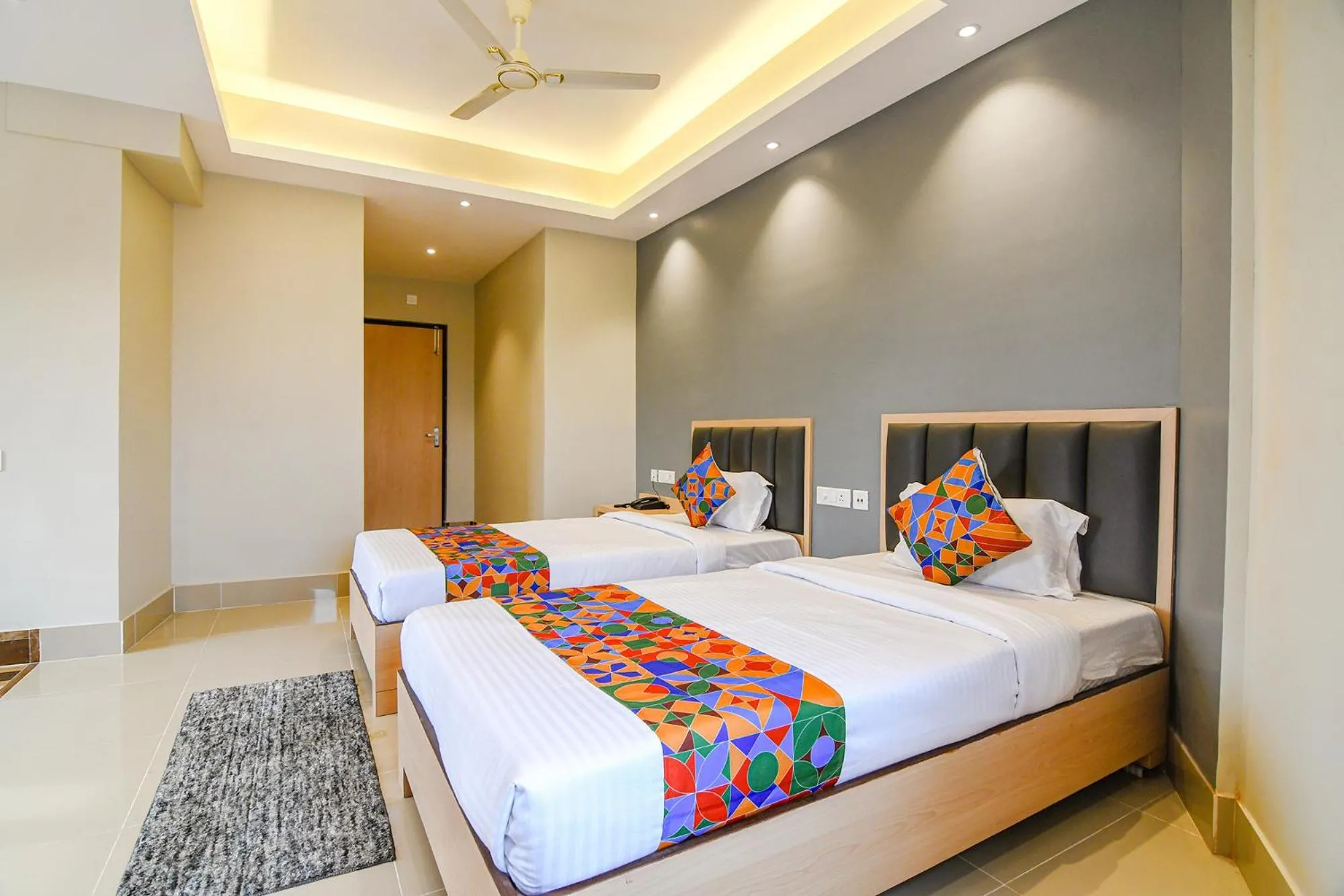 Bed in FabHotel JP - Nr Sataragachhi Railway Station