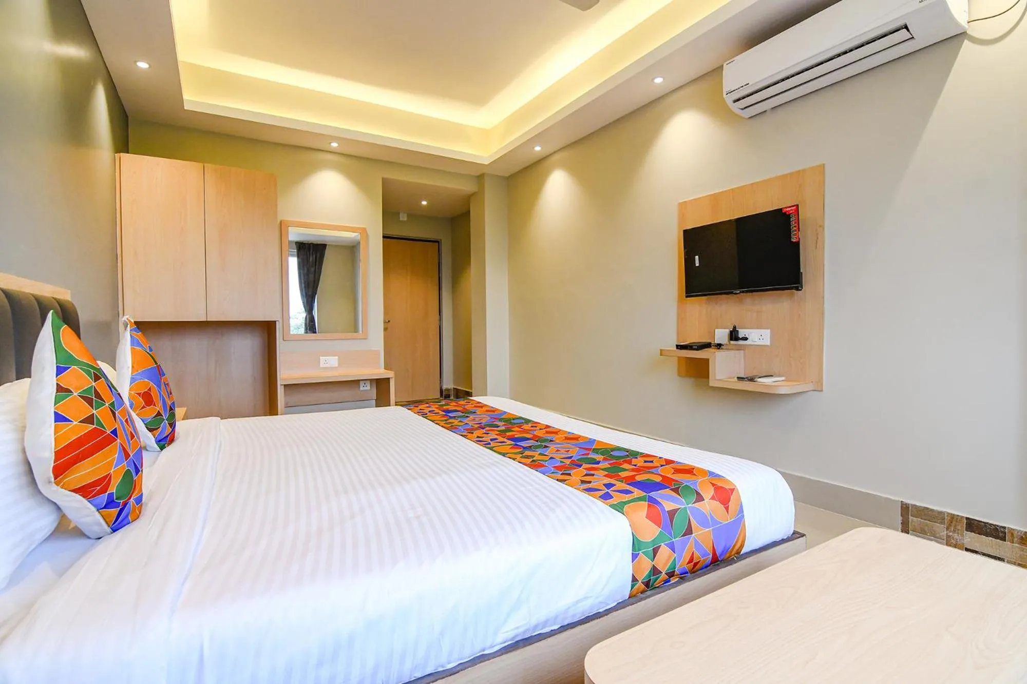Bed in FabHotel JP - Nr Sataragachhi Railway Station