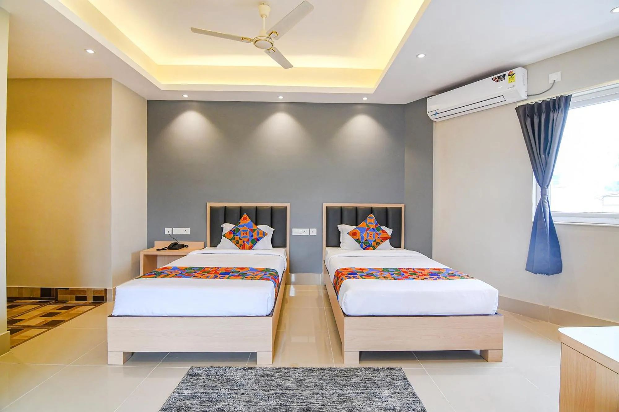 Bed in FabHotel JP - Nr Sataragachhi Railway Station