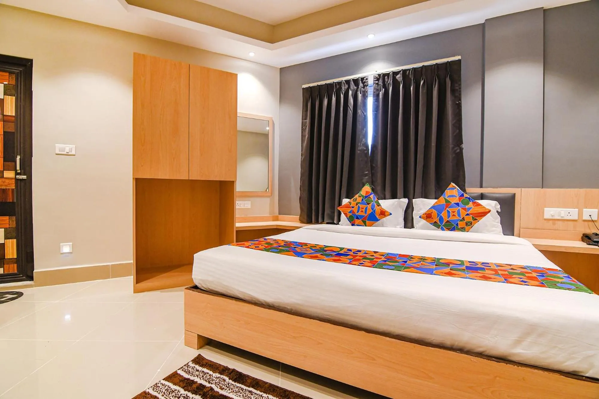 Bed in FabHotel JP - Nr Sataragachhi Railway Station
