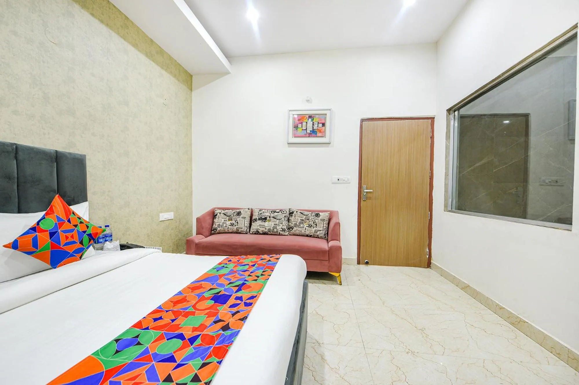 Bed in FabHotel Kavya Inn - Nr The Mall of Faridabad
