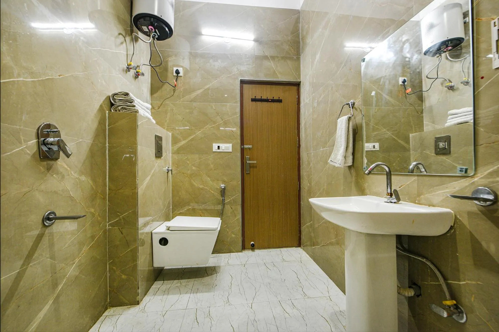 Bathroom in FabHotel Kavya Inn - Nr The Mall of Faridabad