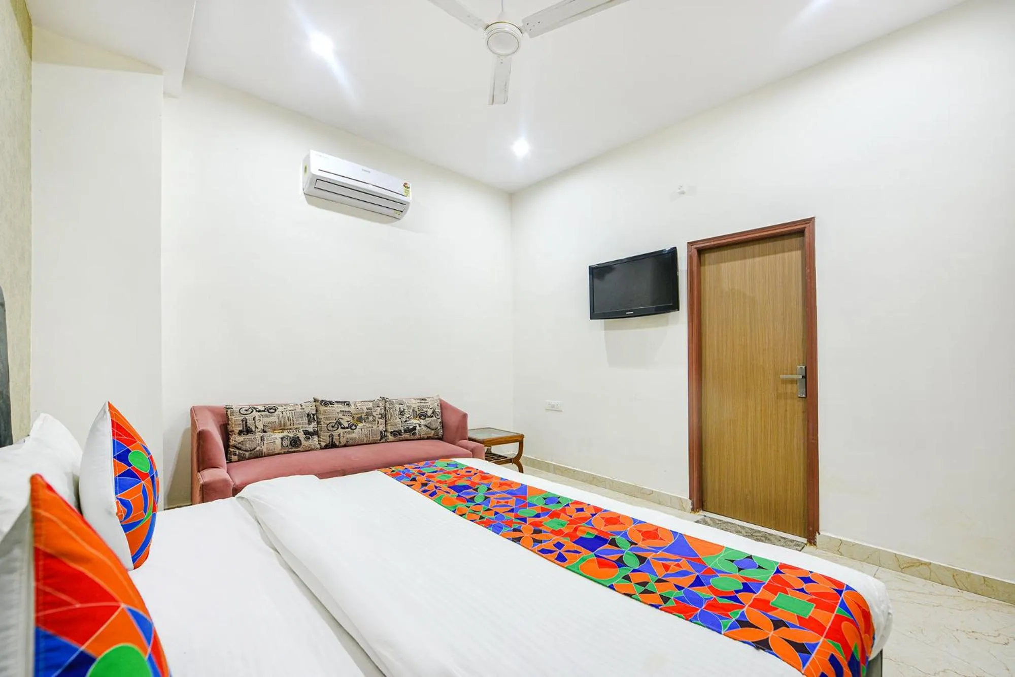 Bed in FabHotel Kavya Inn - Nr The Mall of Faridabad