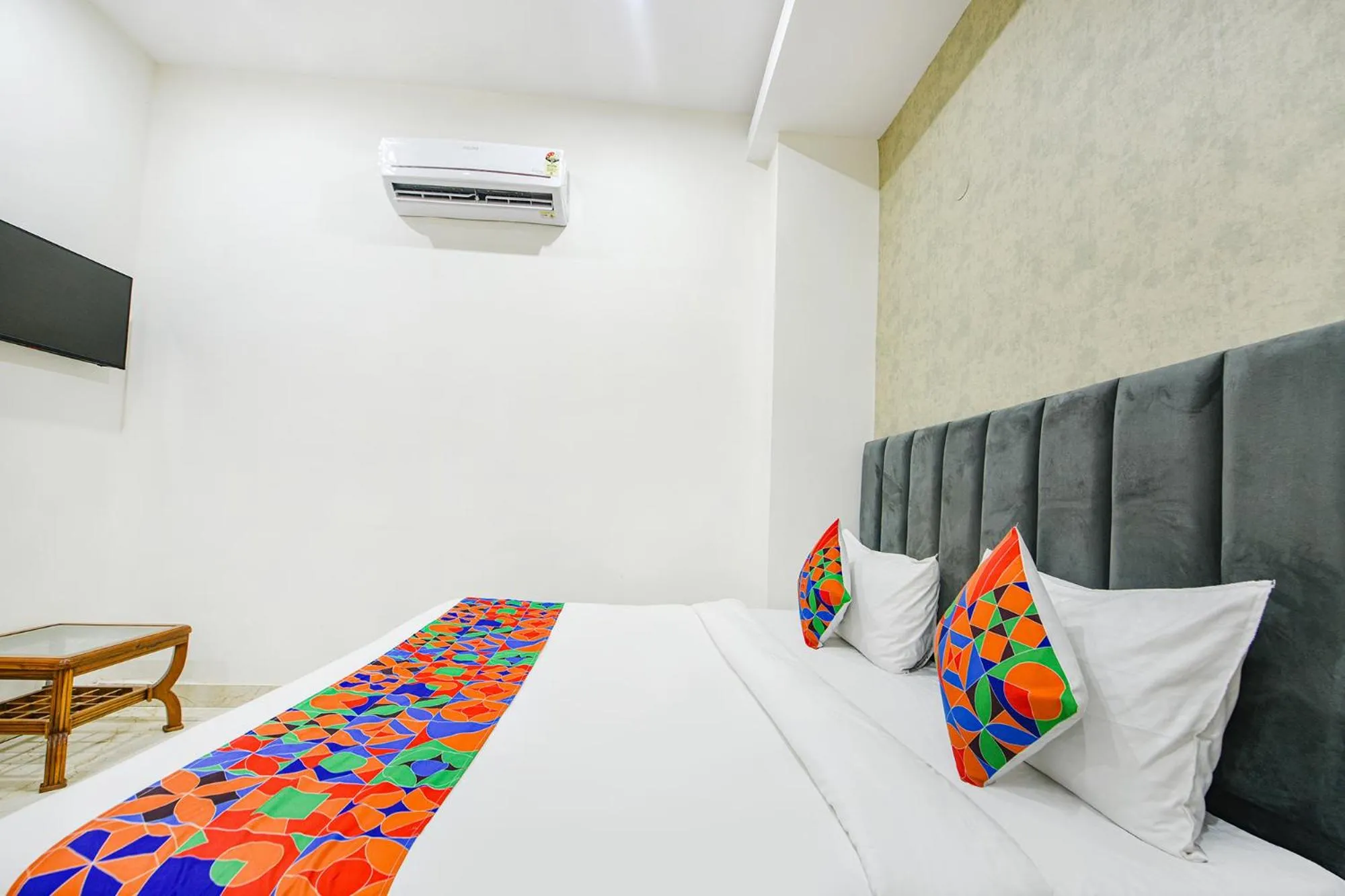 Bed in FabHotel Kavya Inn - Nr The Mall of Faridabad