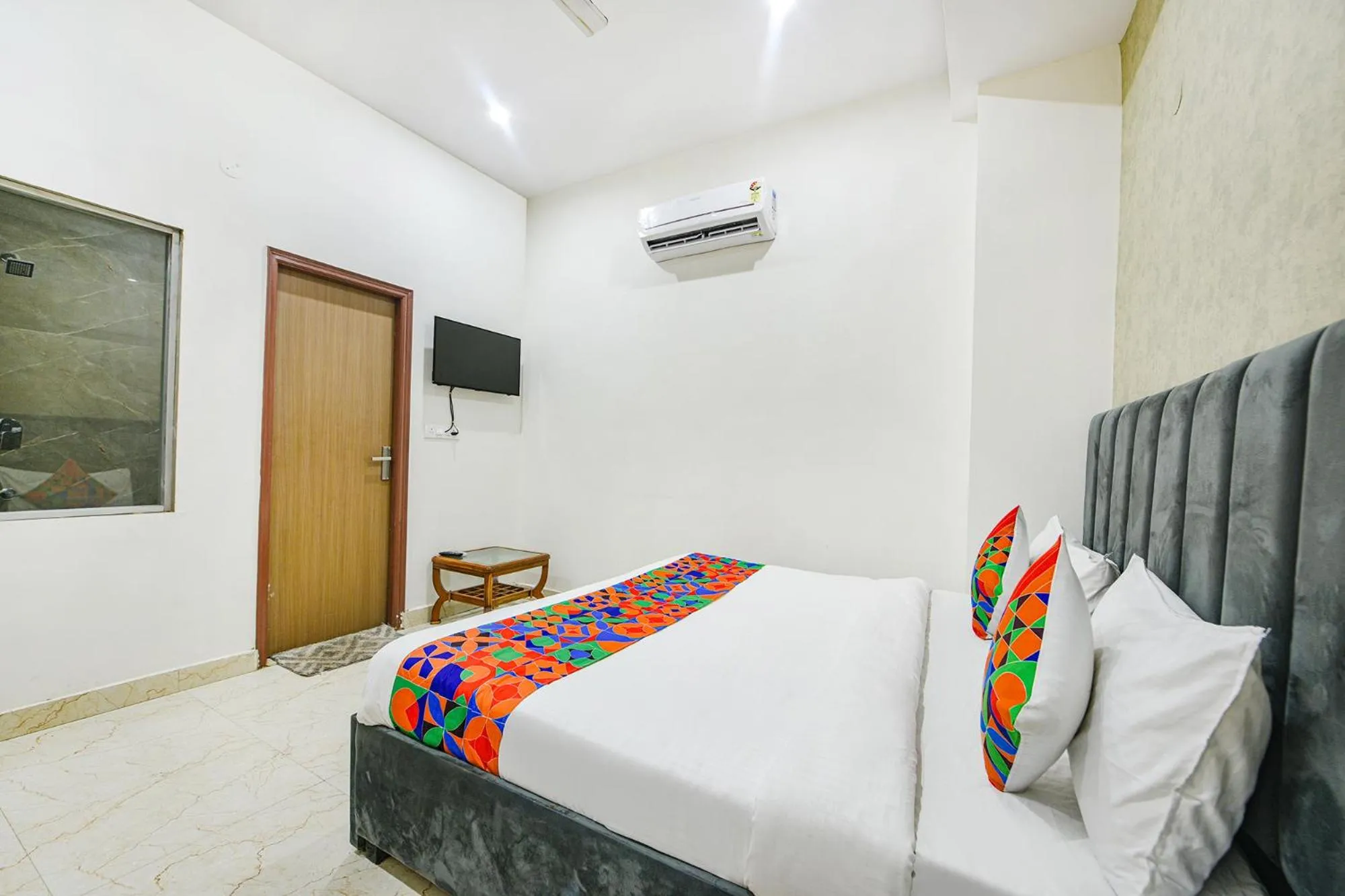 Bed in FabHotel Kavya Inn - Nr The Mall of Faridabad