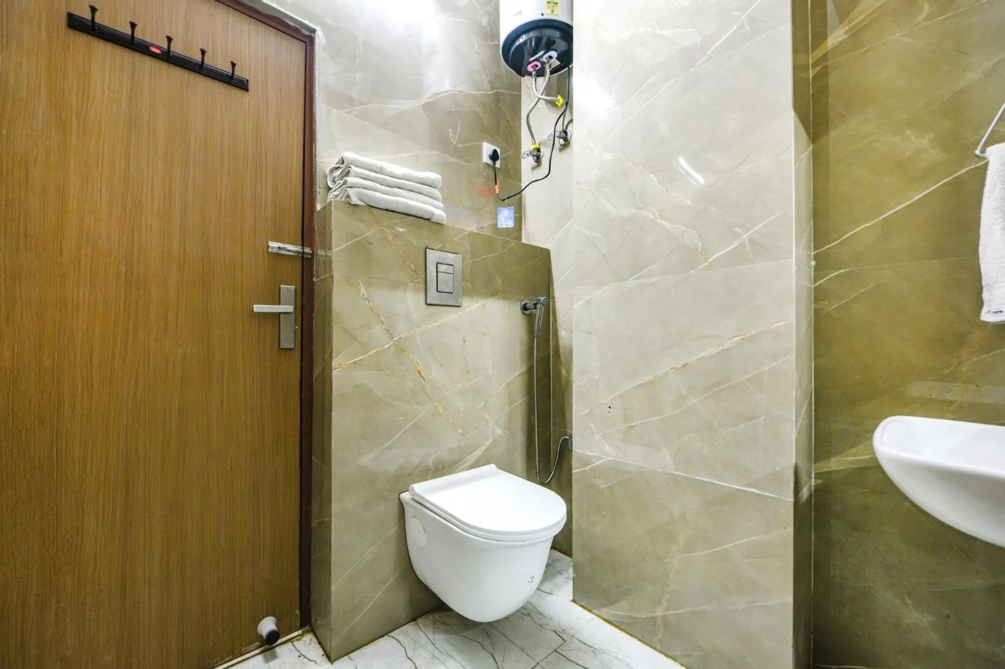Bathroom in FabHotel Kavya Inn - Nr The Mall of Faridabad