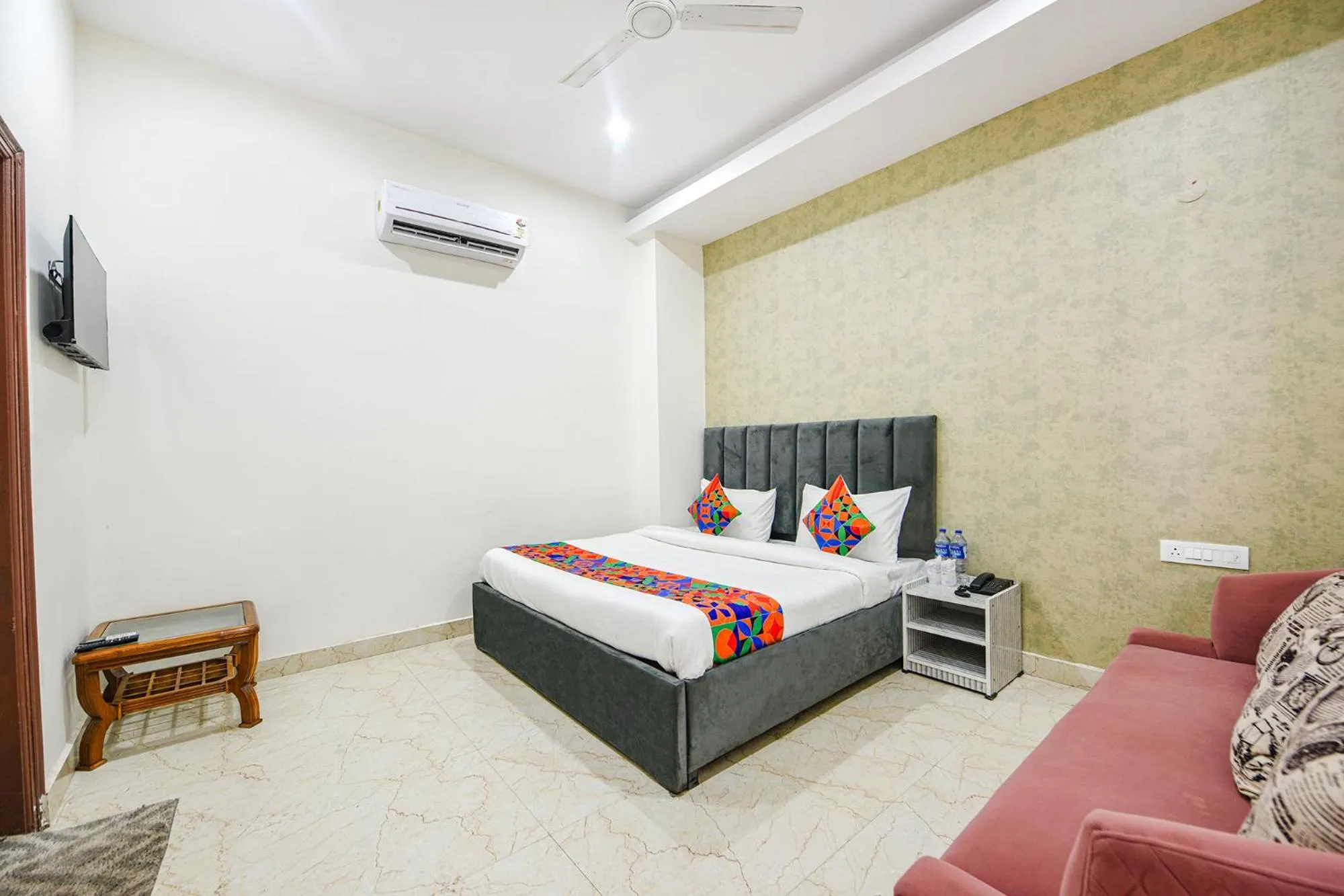 Bed in FabHotel Kavya Inn - Nr The Mall of Faridabad