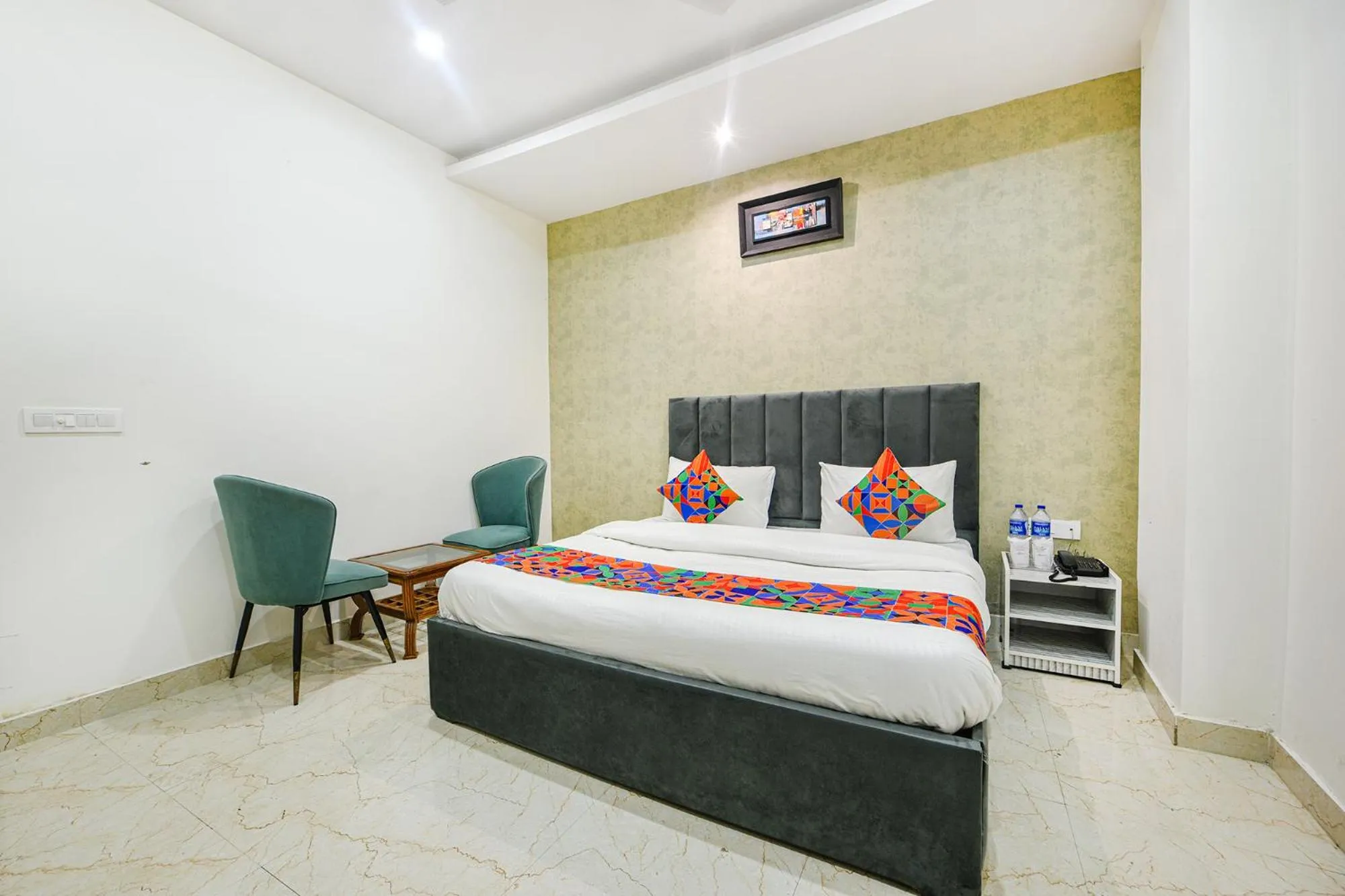 Bed in FabHotel Kavya Inn - Nr The Mall of Faridabad