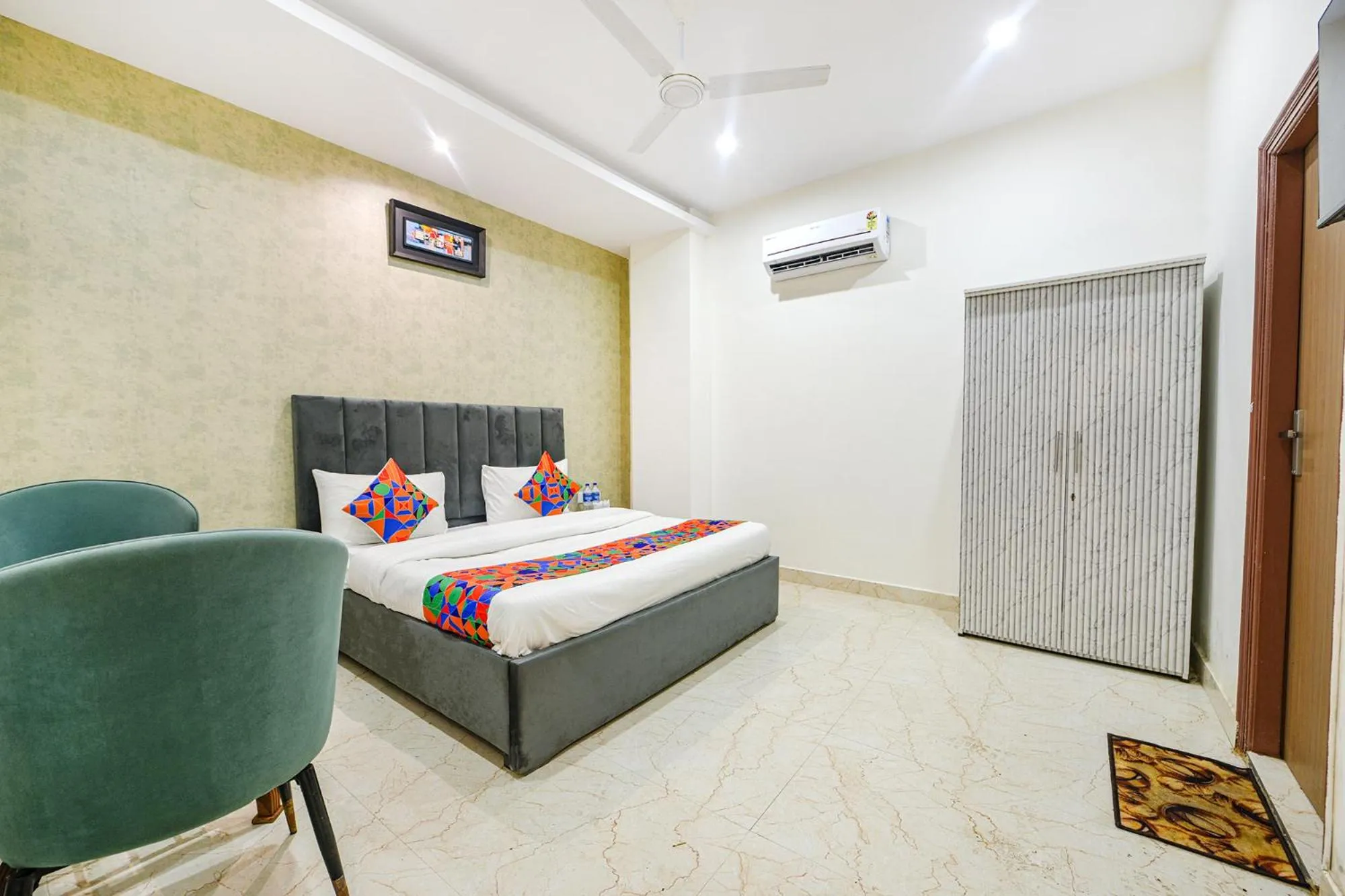 Bed in FabHotel Kavya Inn - Nr The Mall of Faridabad