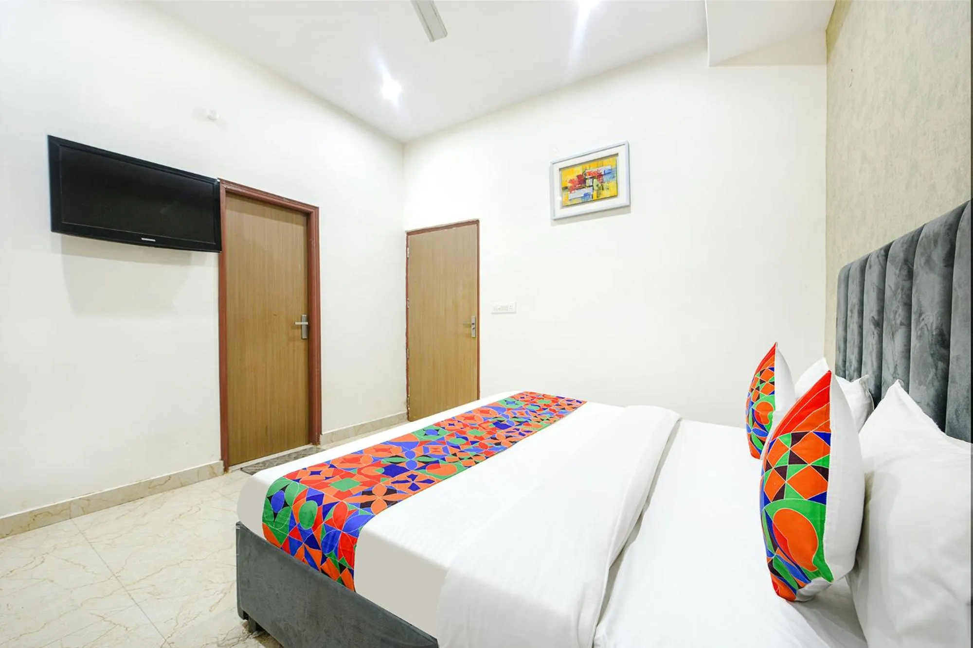 Bed in FabHotel Kavya Inn - Nr The Mall of Faridabad