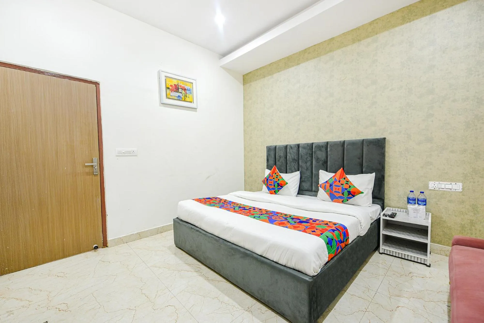 Bed in FabHotel Kavya Inn - Nr The Mall of Faridabad