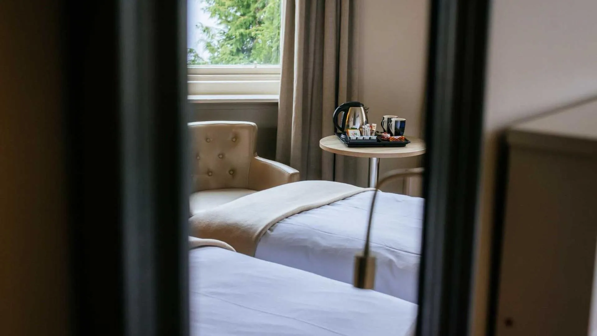 Bed in The Tarbet Hotel