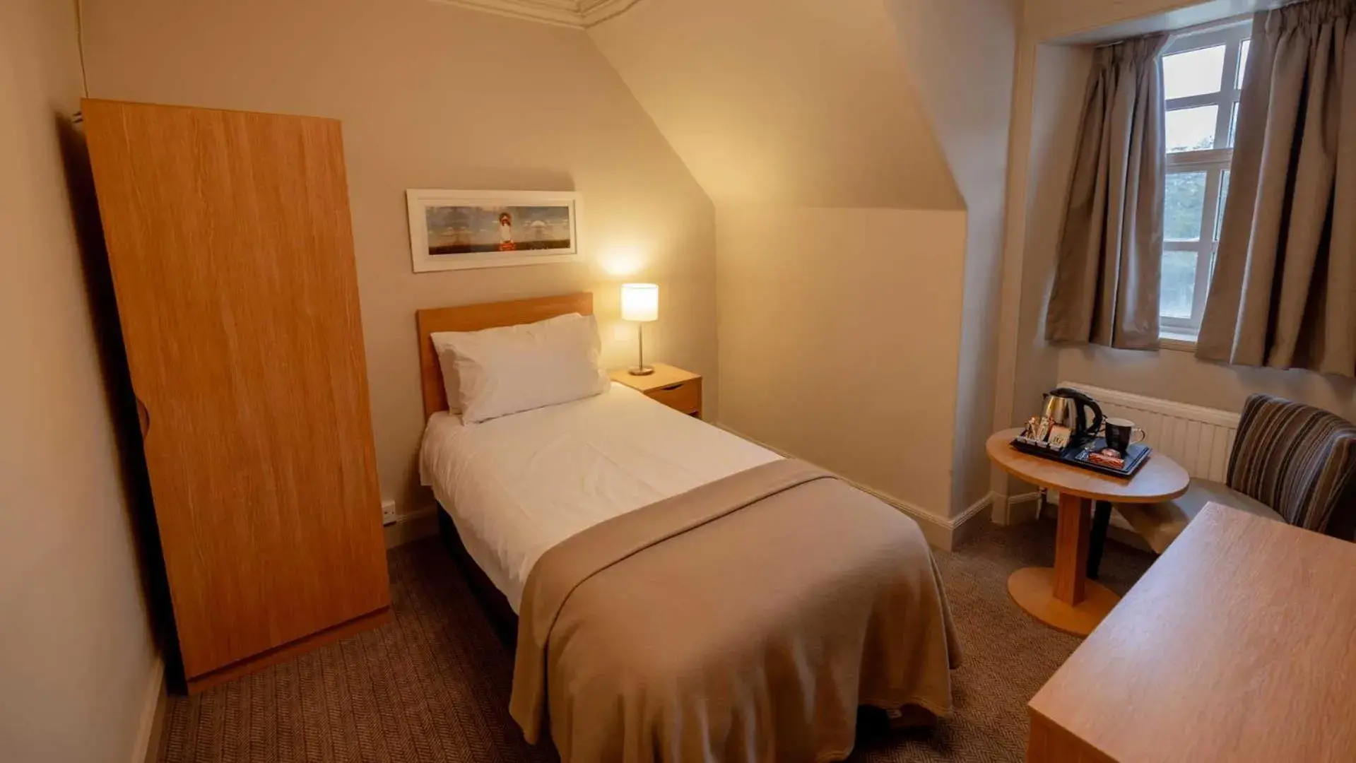 Bed in The Tarbet Hotel Bed in The Tarbet Hotel