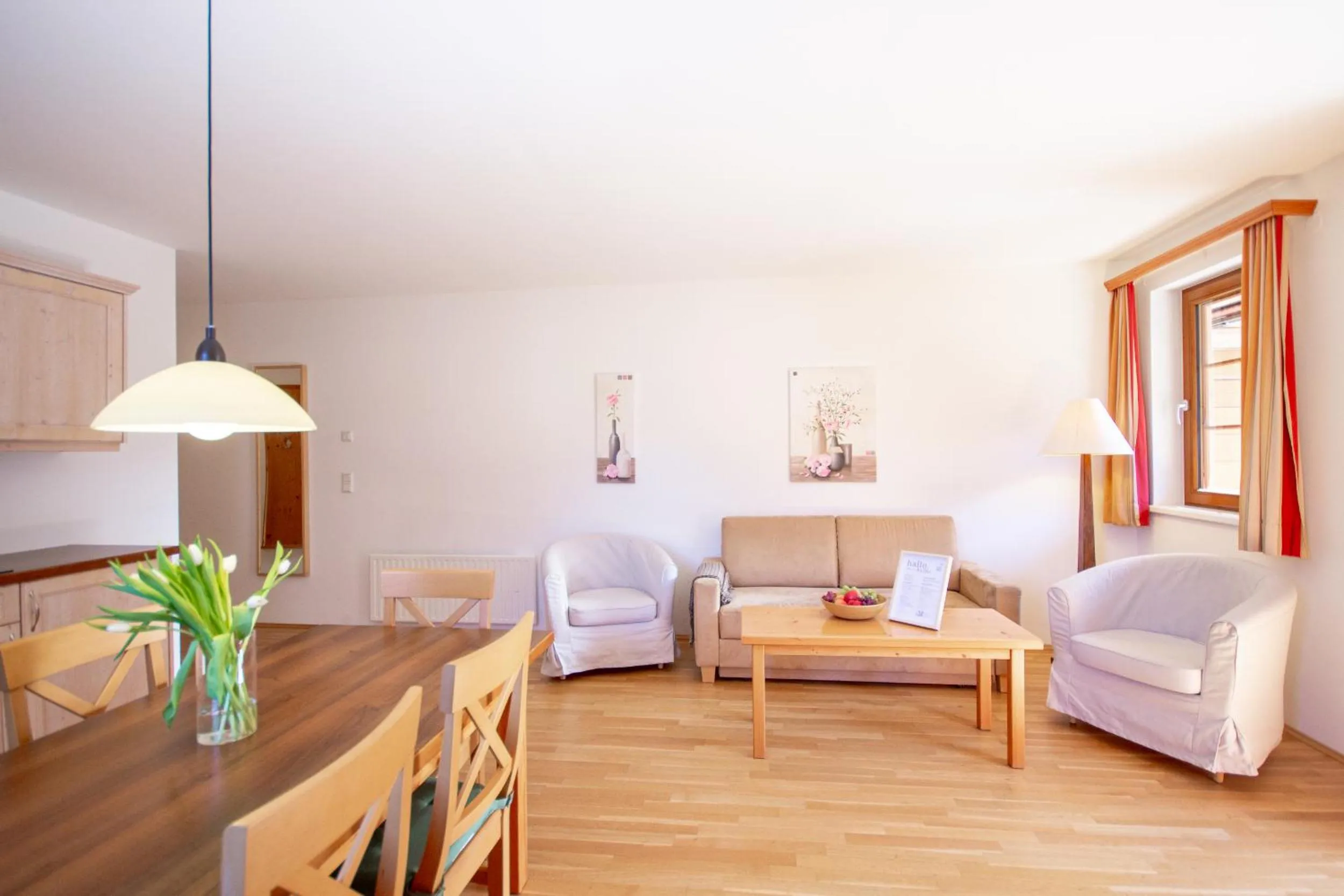 Living room, Bed in Appartements Stranach