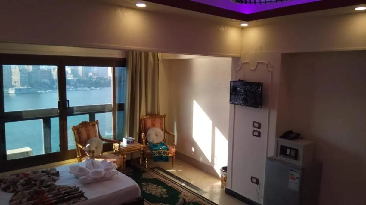 Seating area, Bed in Nile sky hotel and suites