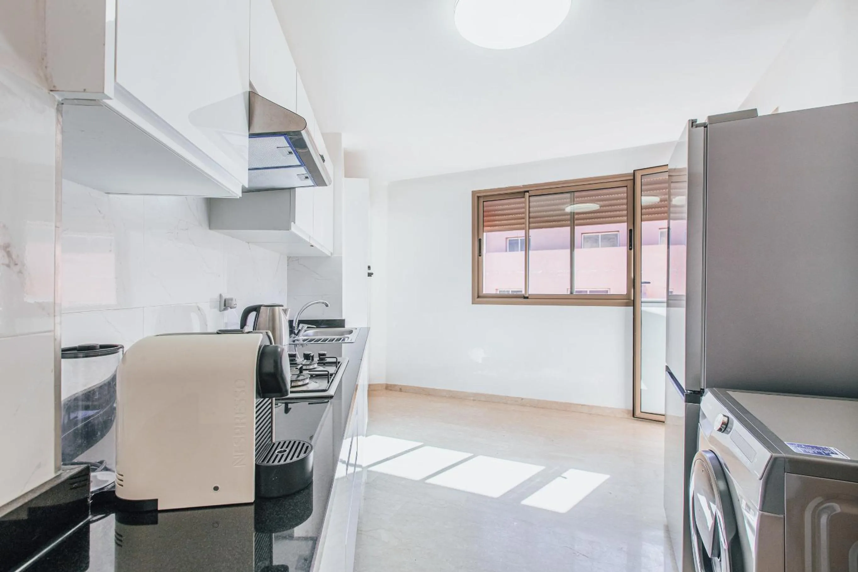 Kitchen or kitchenette in Migdal Gueliz Apart Hôtel