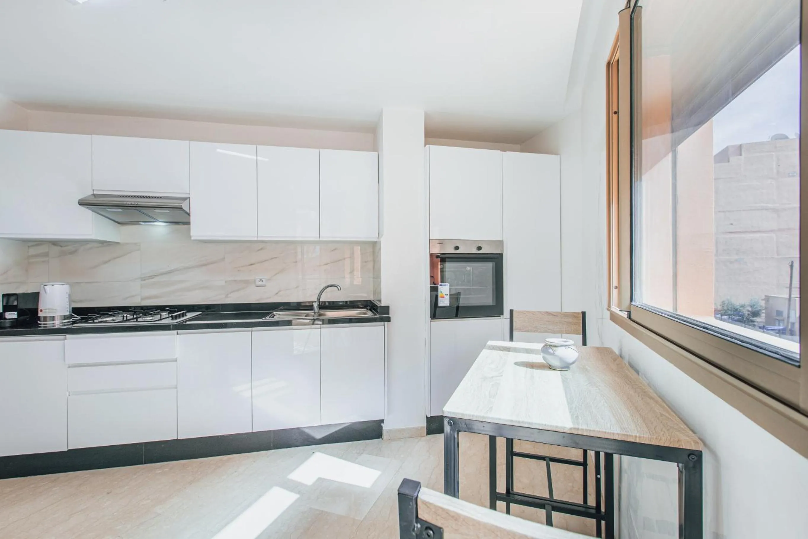 Kitchen or kitchenette in Migdal Gueliz Apart Hôtel