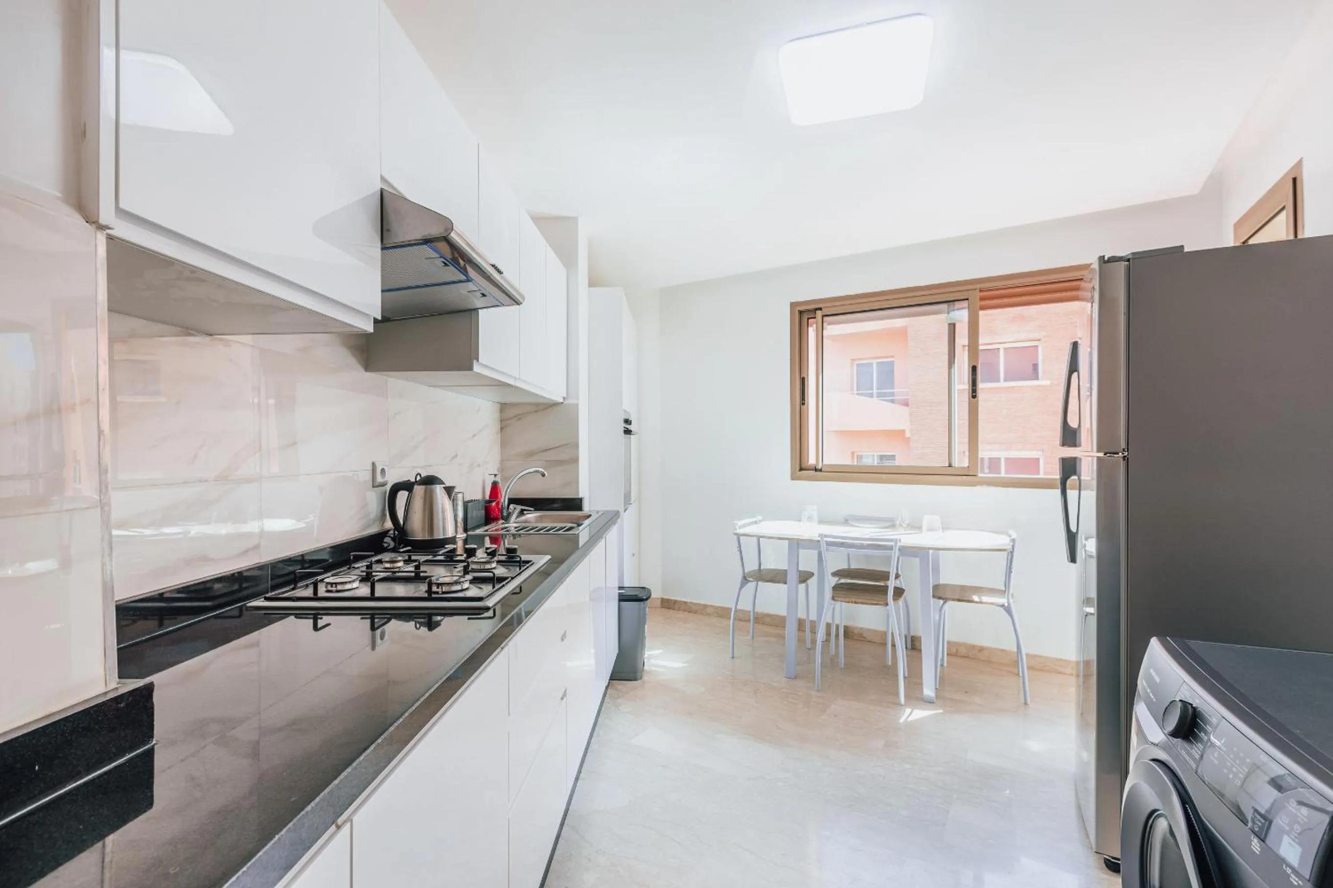 Kitchen or kitchenette in Migdal Gueliz Apart Hôtel