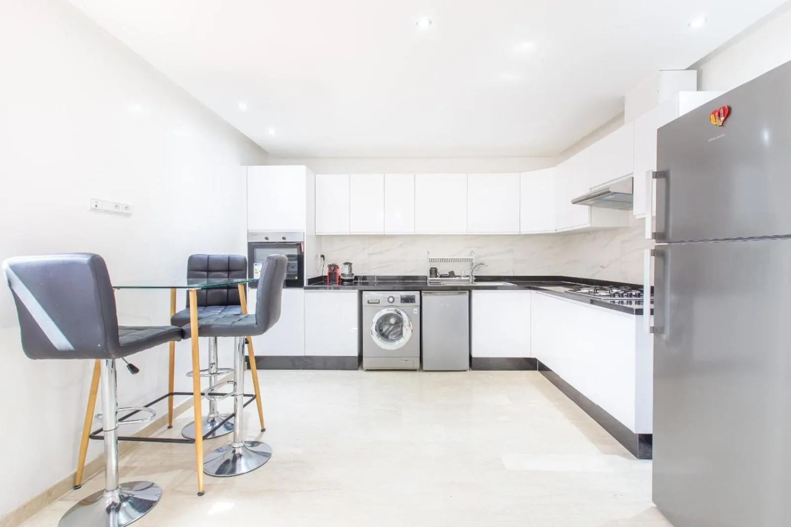 Kitchen or kitchenette in Migdal Gueliz Apart Hôtel