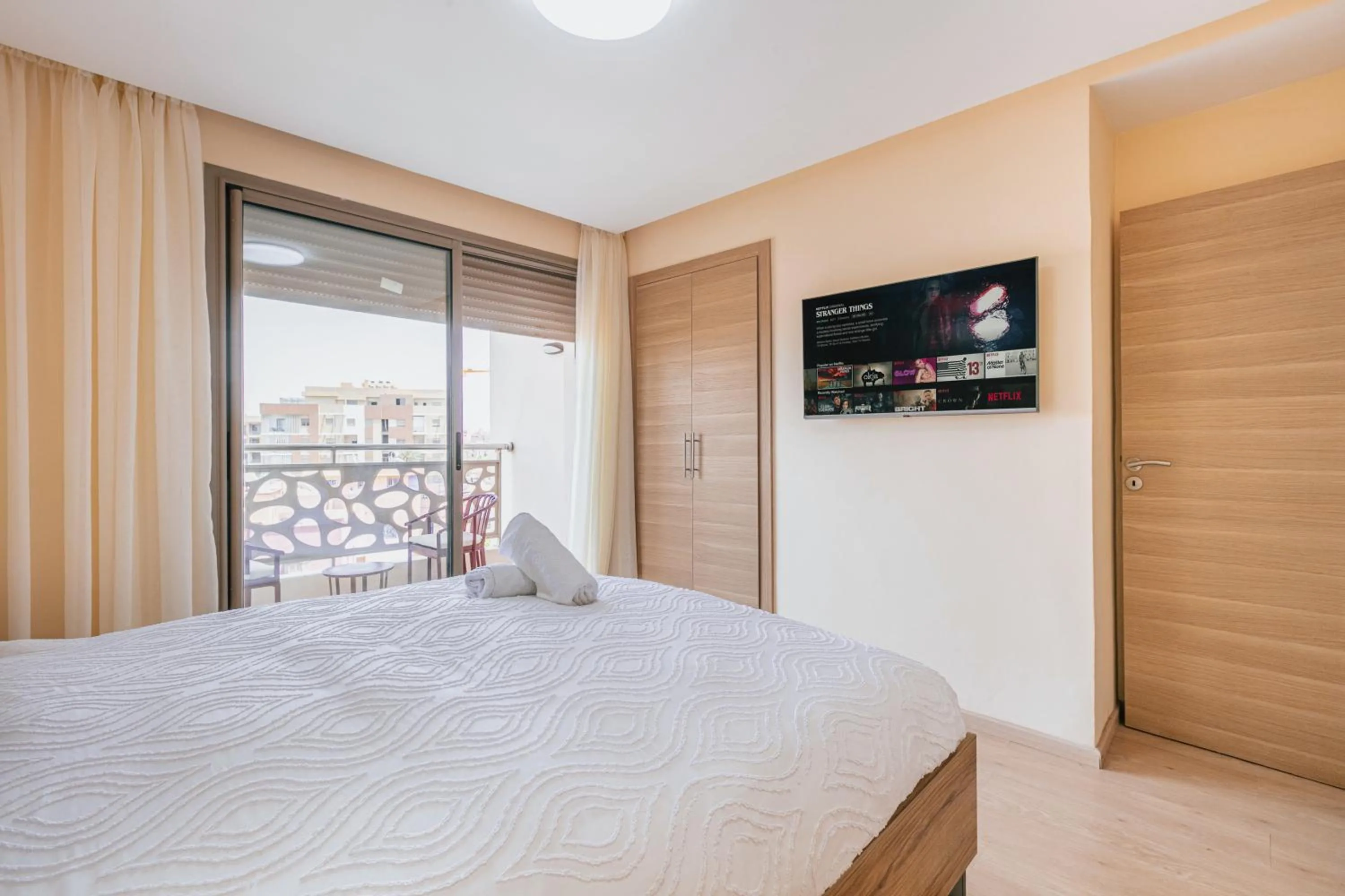 Communal lounge/ TV room, Bed in Migdal Gueliz Apart Hôtel