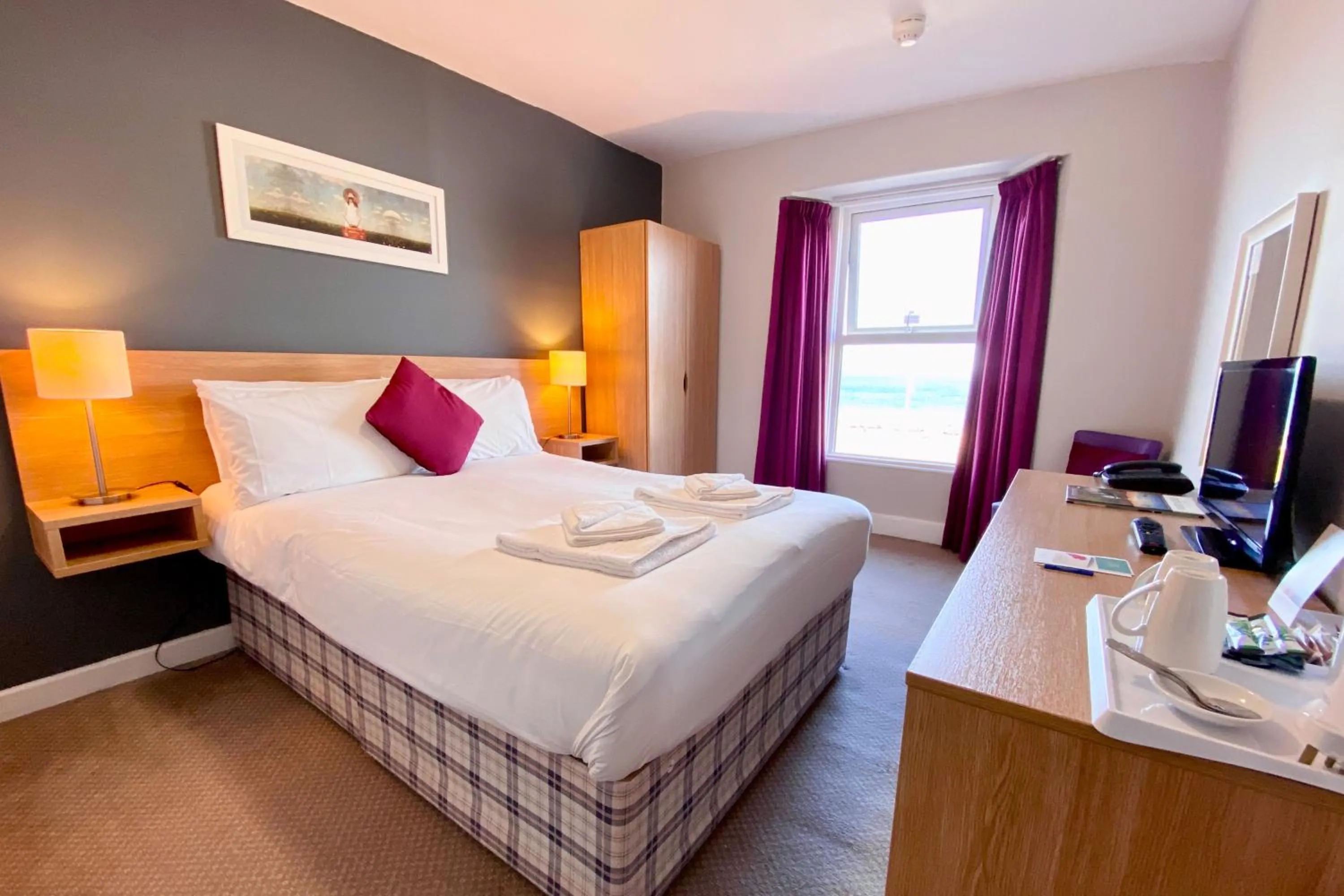 Bed in The Esplanade Hotel by Compass Hospitality