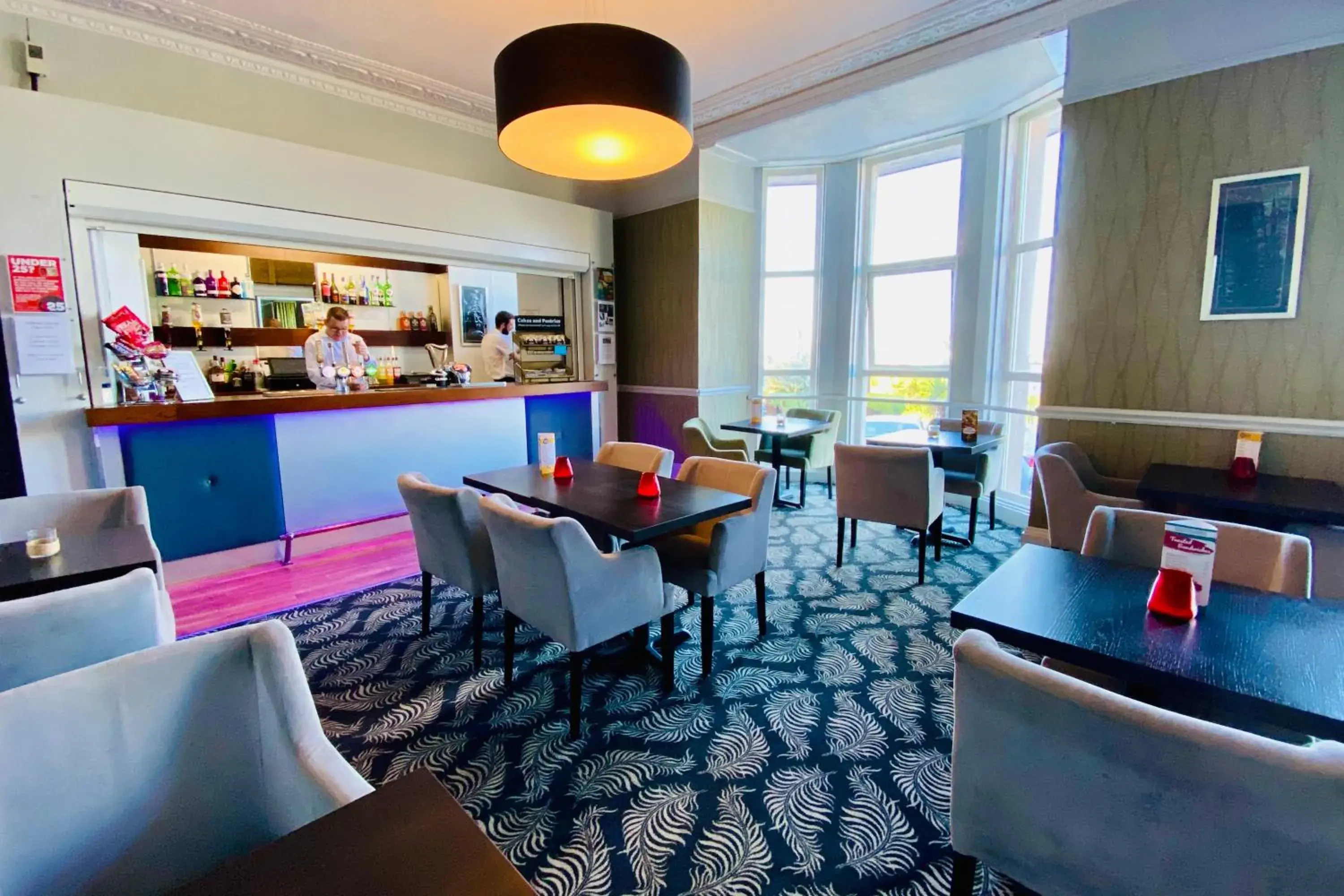 Lounge or bar in The Esplanade Hotel by Compass Hospitality Lounge or bar in The Esplanade Hotel by Compass Hospitality