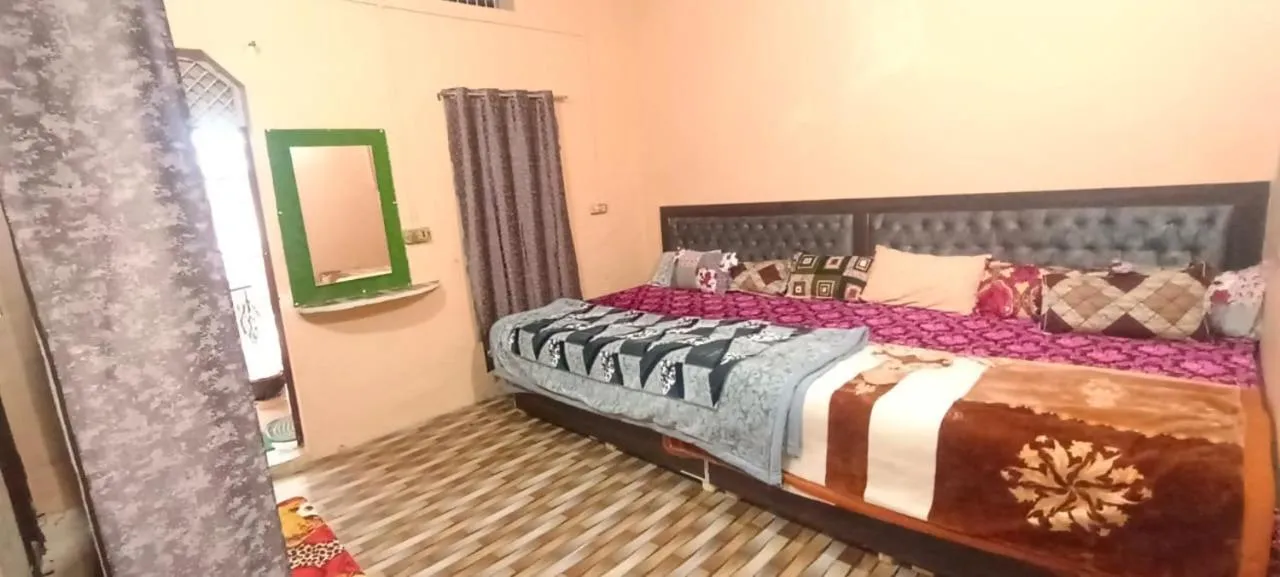 Photo of the whole room, Bed in Shree Gopal Niketan