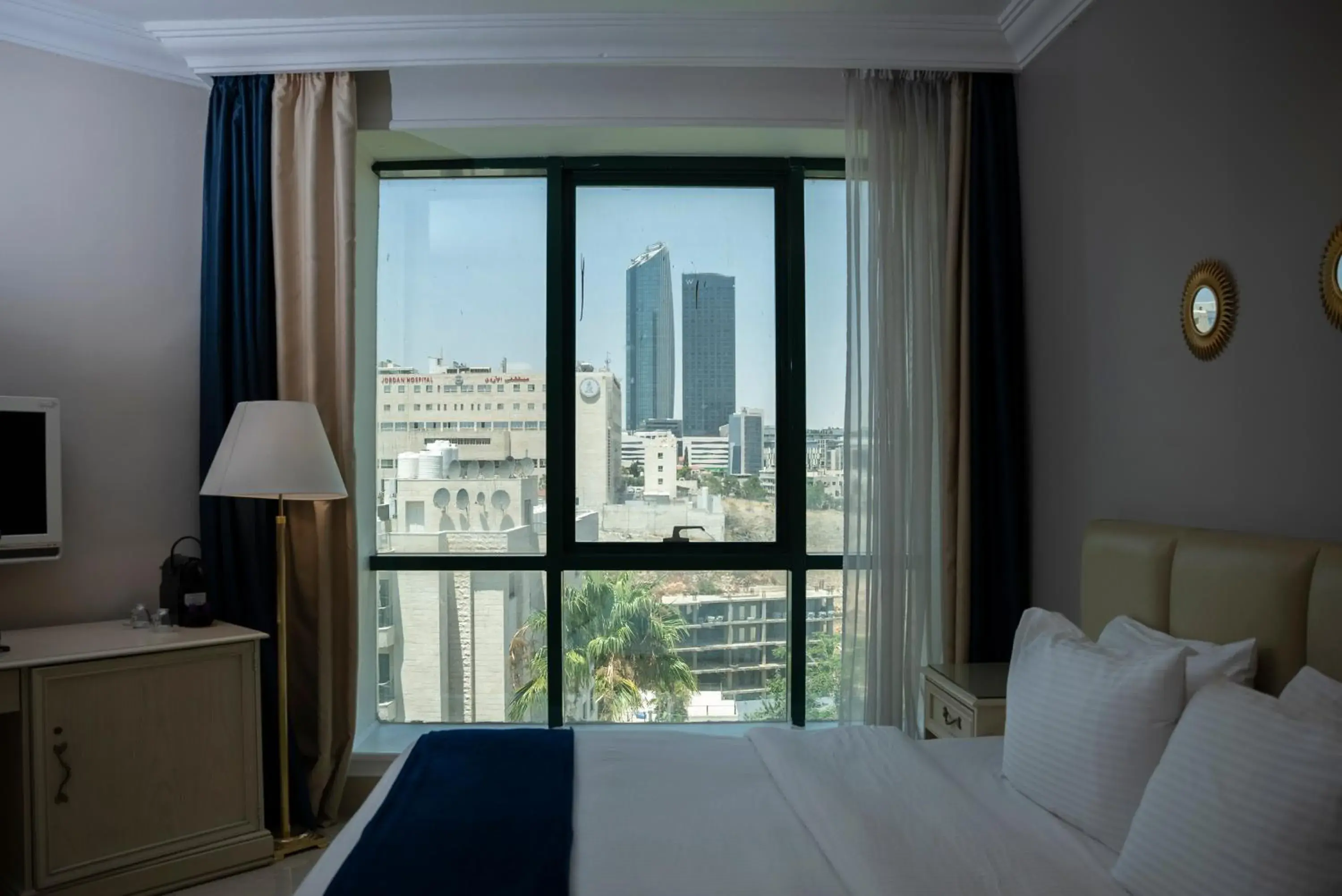 Communal lounge/ TV room, Bed in Amman West Luxury Hotel Communal lounge/ TV room, Bed in Amman West Luxury Hotel