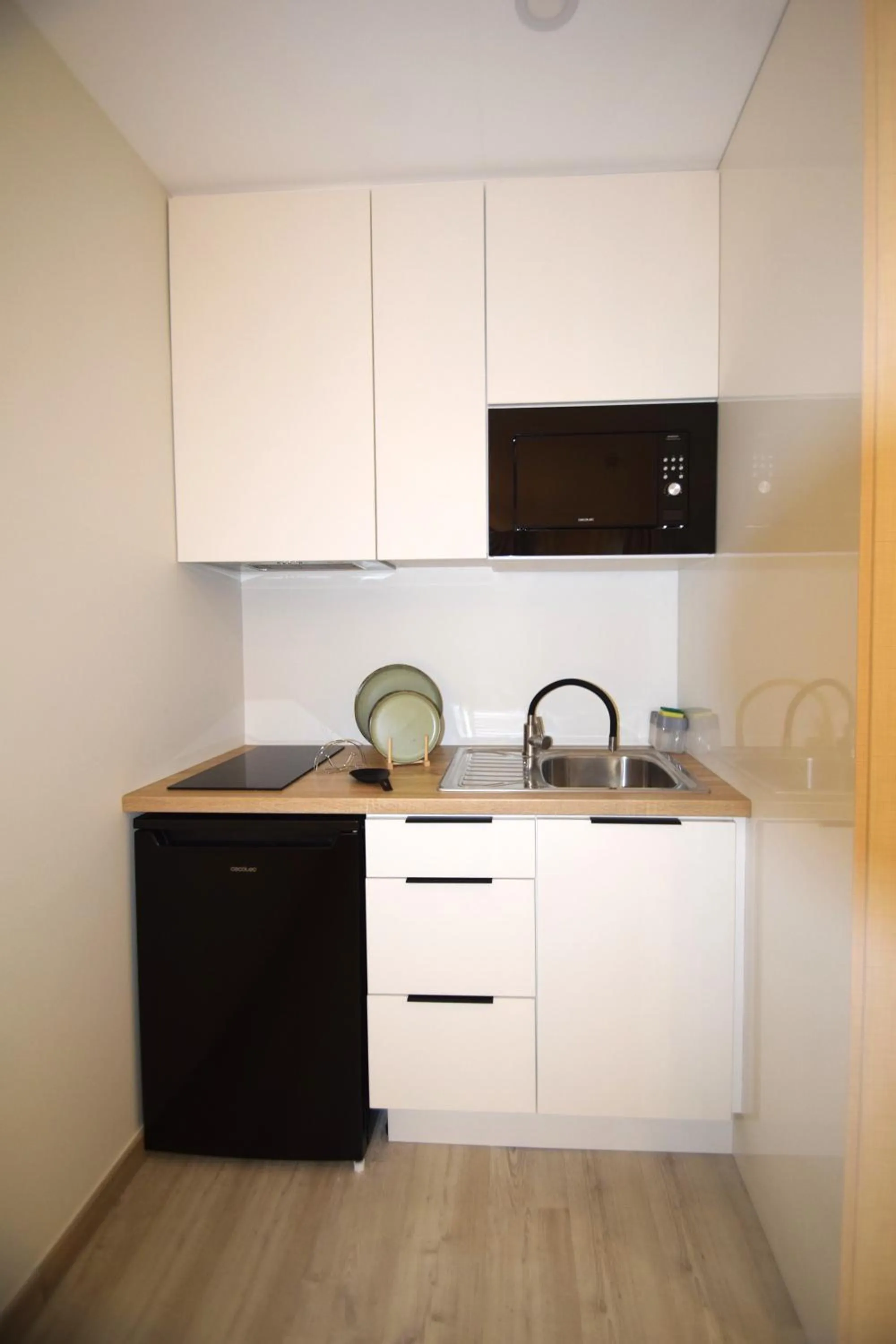 Kitchen or kitchenette in SIENNA Hotel