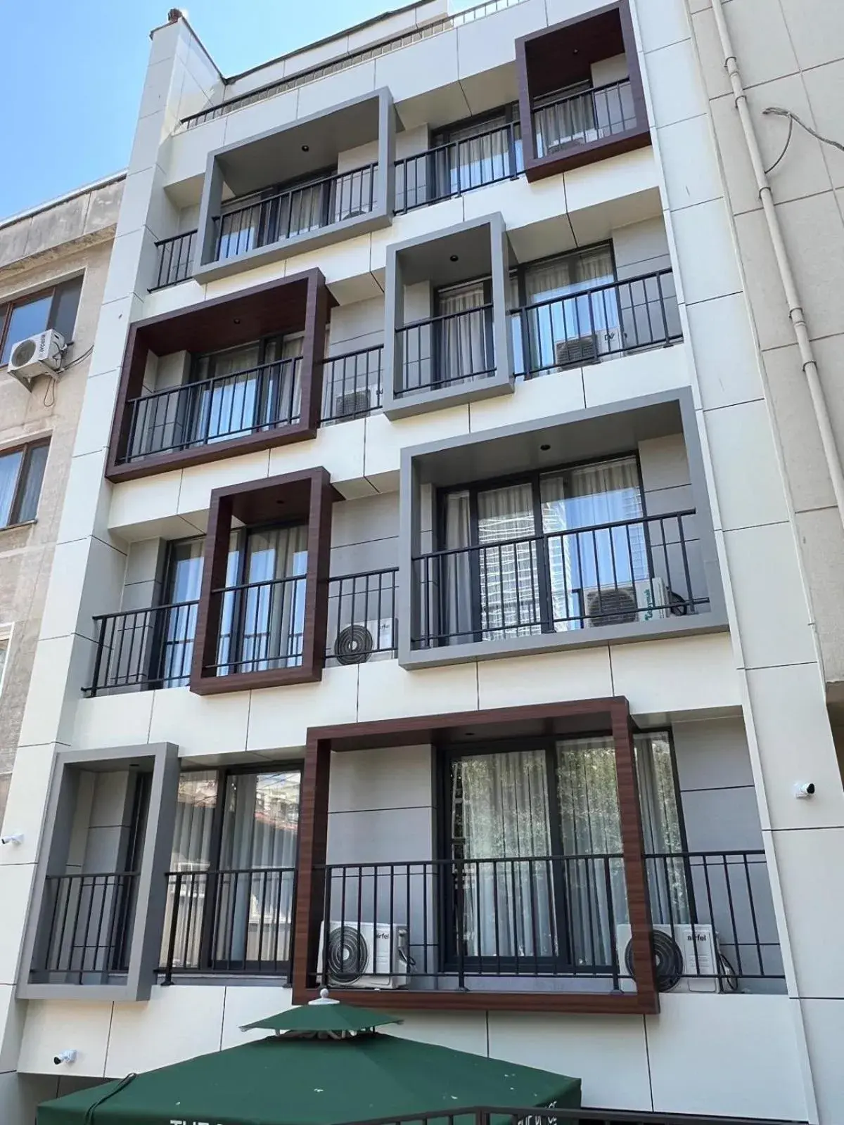 Property building in The Place Suit & Apartments Property building in The Place Suit & Apartments