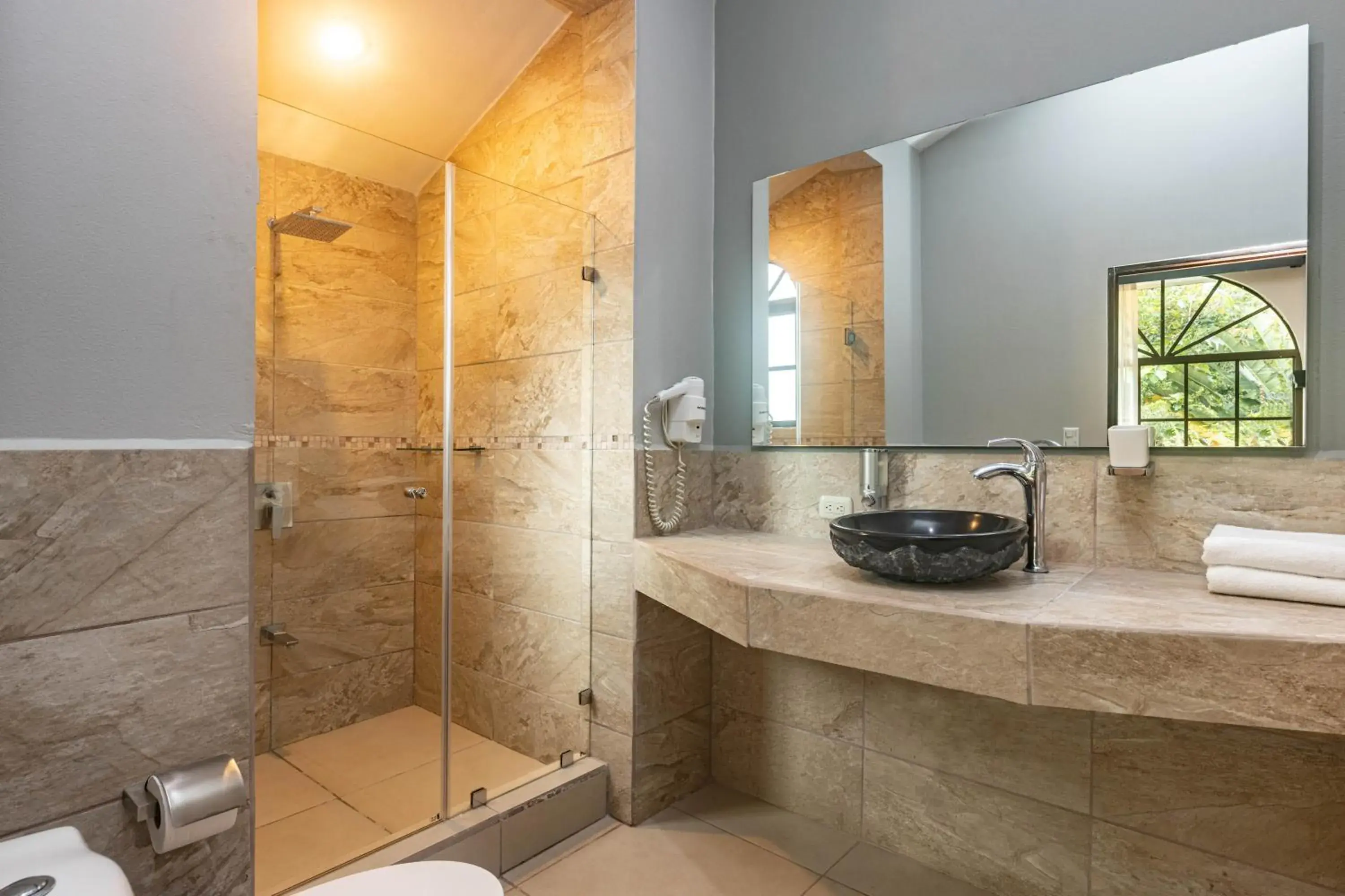 Bathroom in Tifakara Boutique Hotel & Birding Oasis Bathroom in Tifakara Boutique Hotel & Birding Oasis