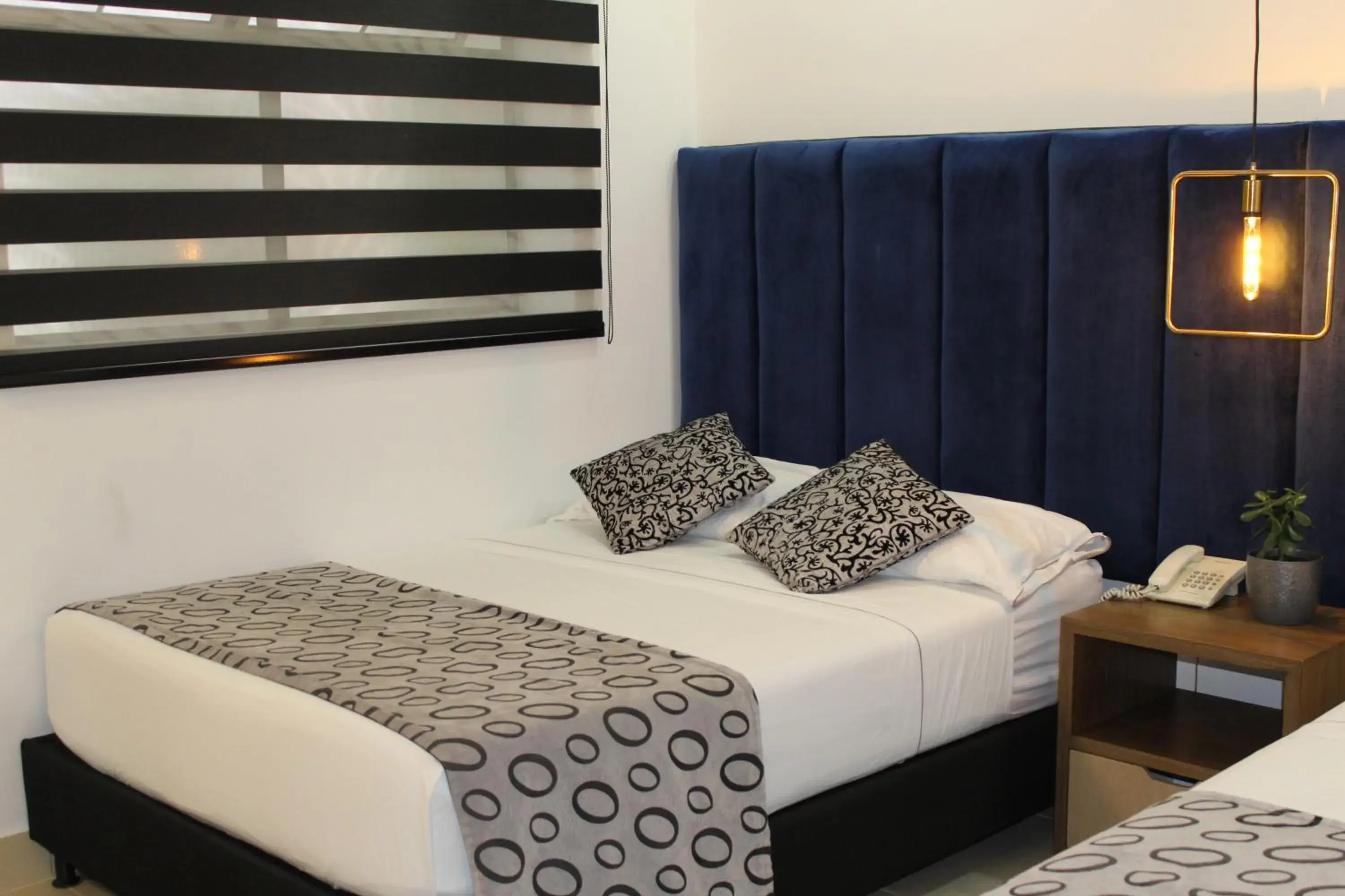 Bed in Hotel Merlott Lleras Bed in Hotel Merlott Lleras