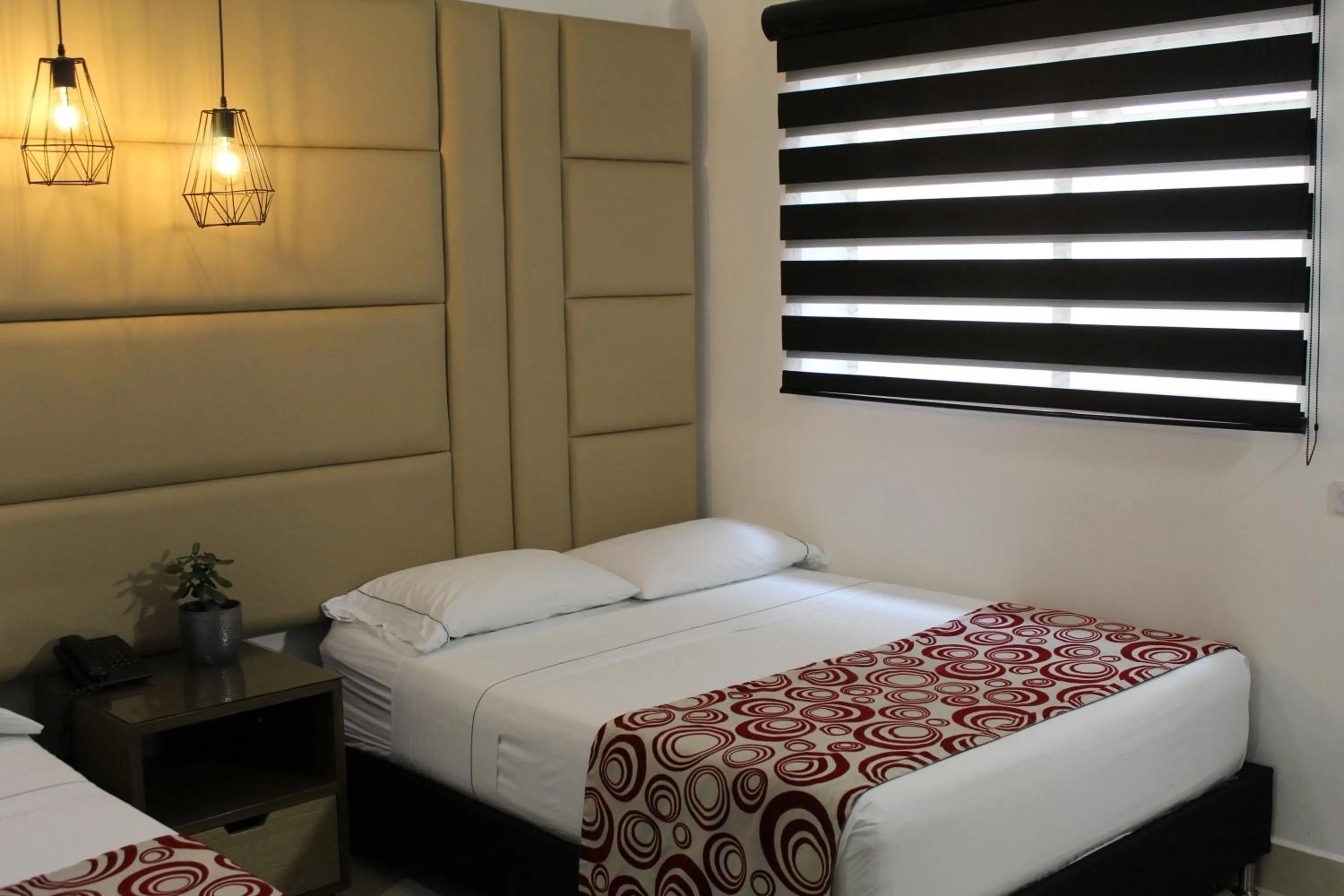 Bed in Hotel Merlott Lleras