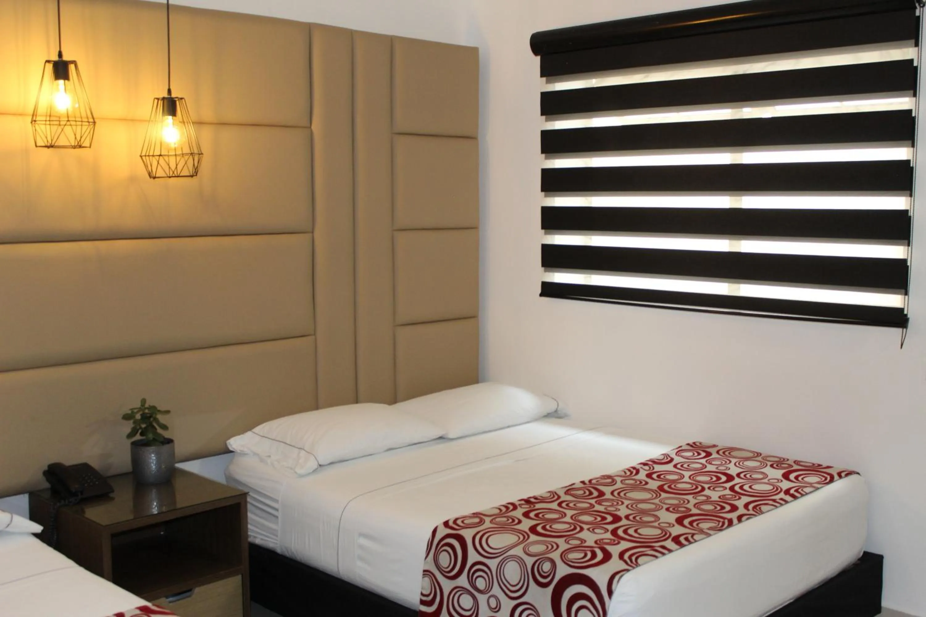 Bed in Hotel Merlott Lleras