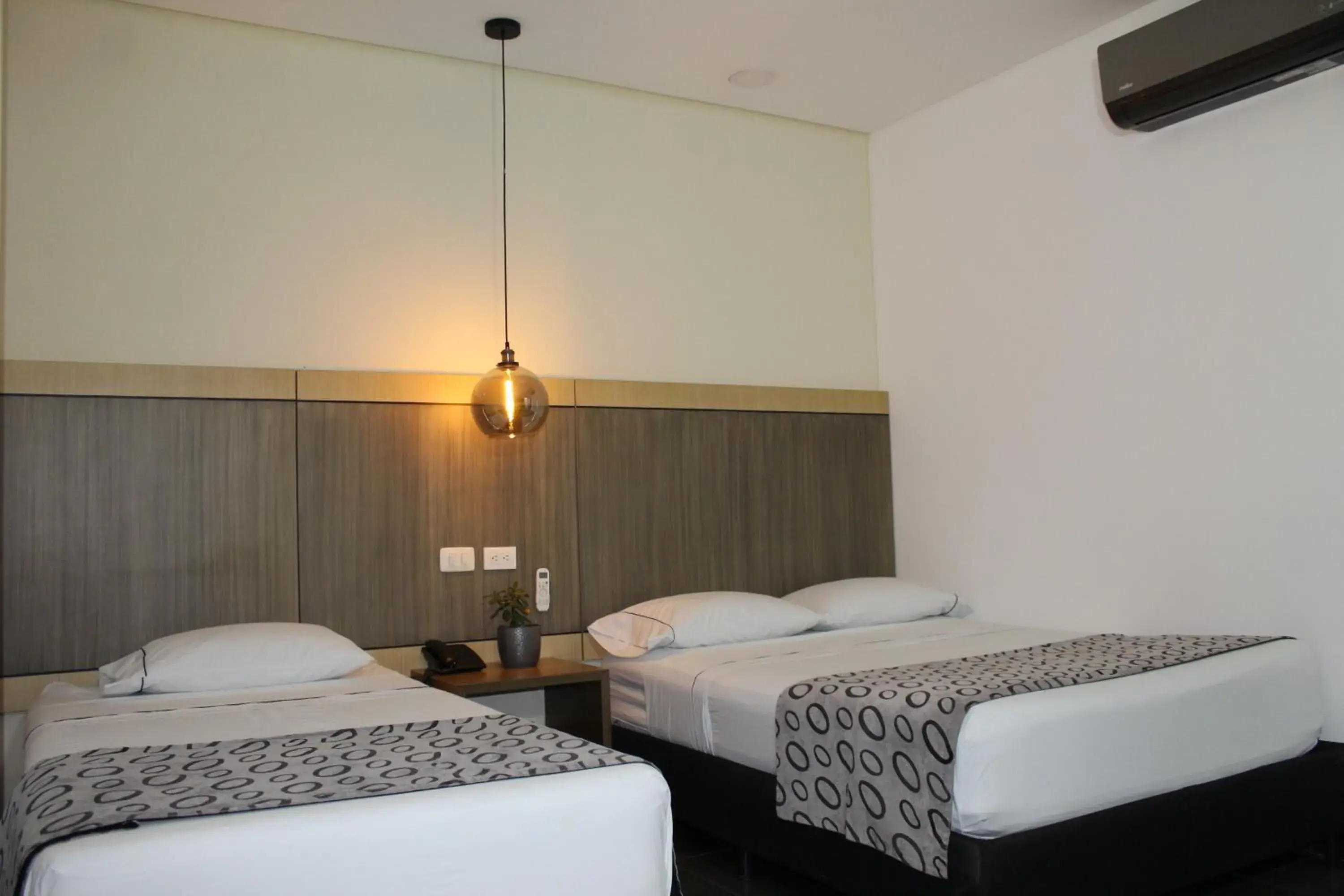 Bed in Hotel Merlott Lleras Bed in Hotel Merlott Lleras