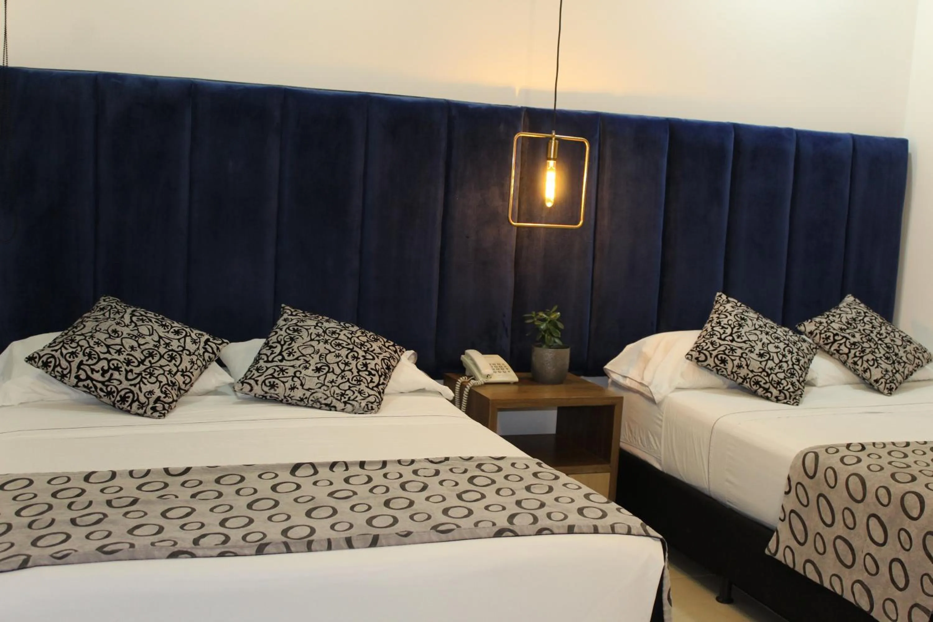 Classic Triple Room in Hotel Merlott Lleras