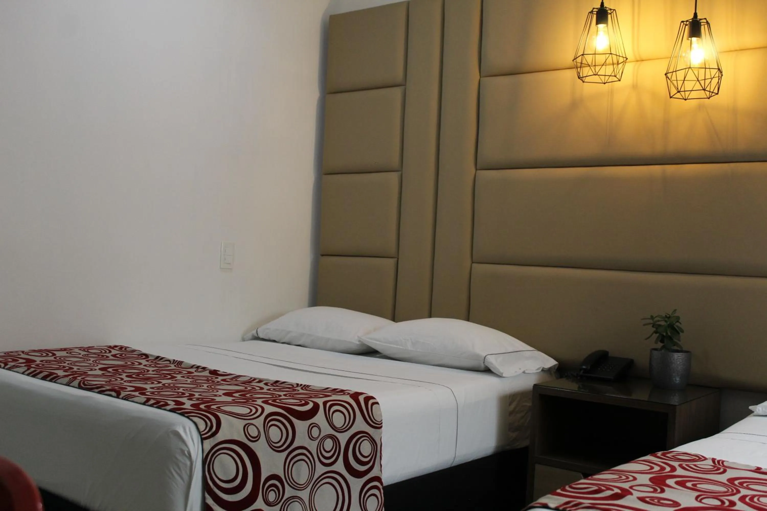 Bed in Hotel Merlott Lleras