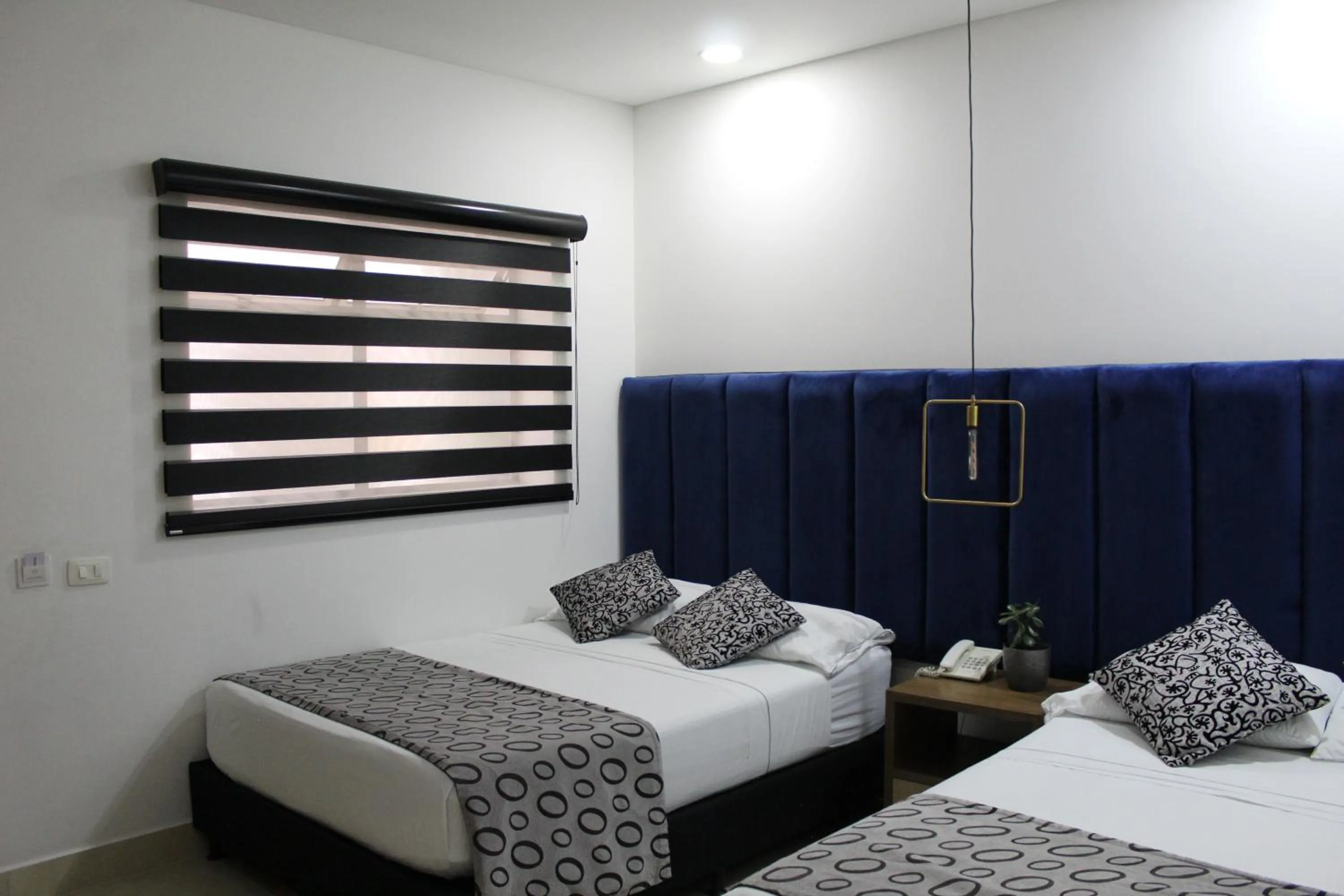 Bed in Hotel Merlott Lleras