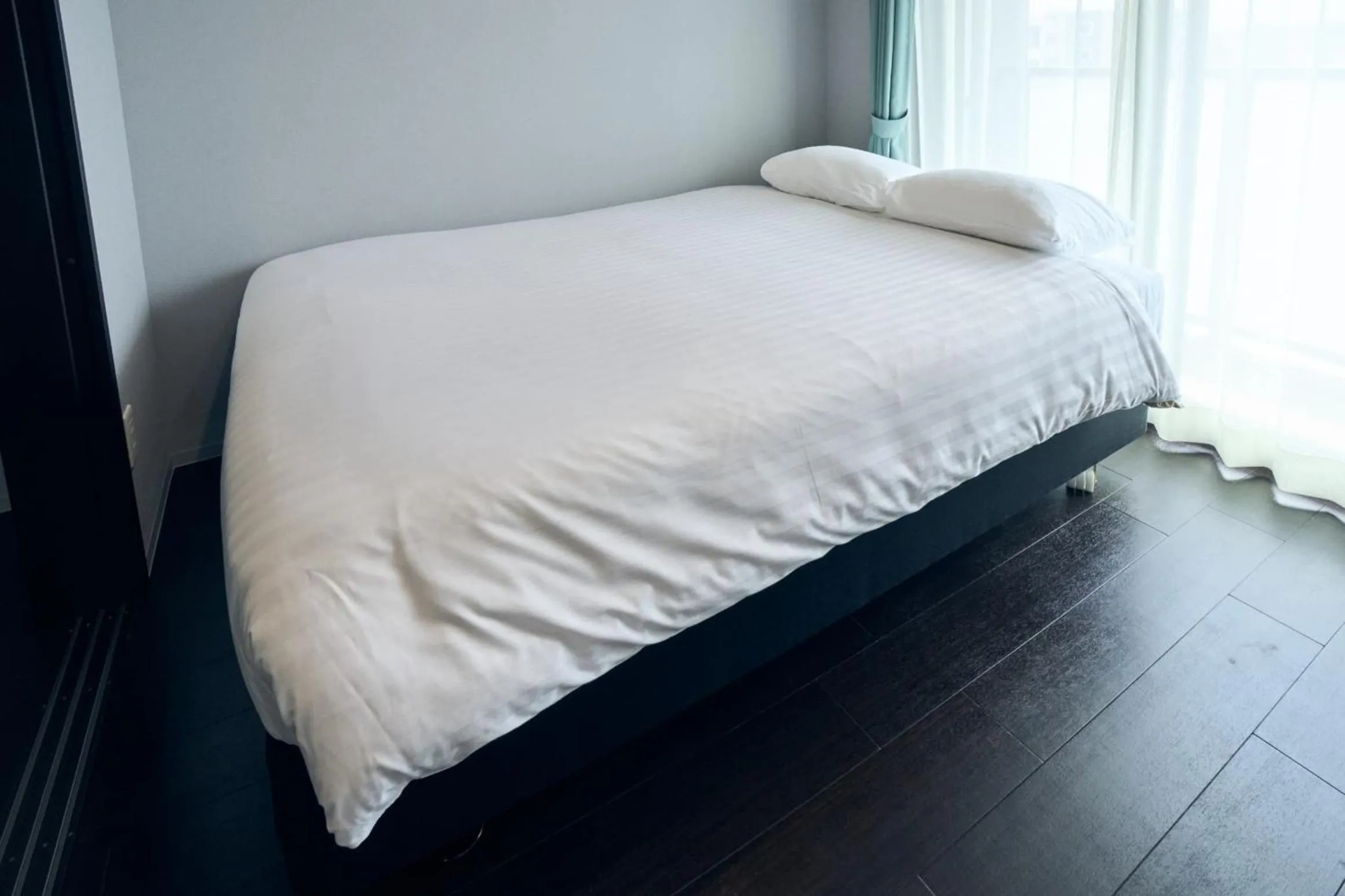 Bed in Vacation Rental Hotel TENMONKAN